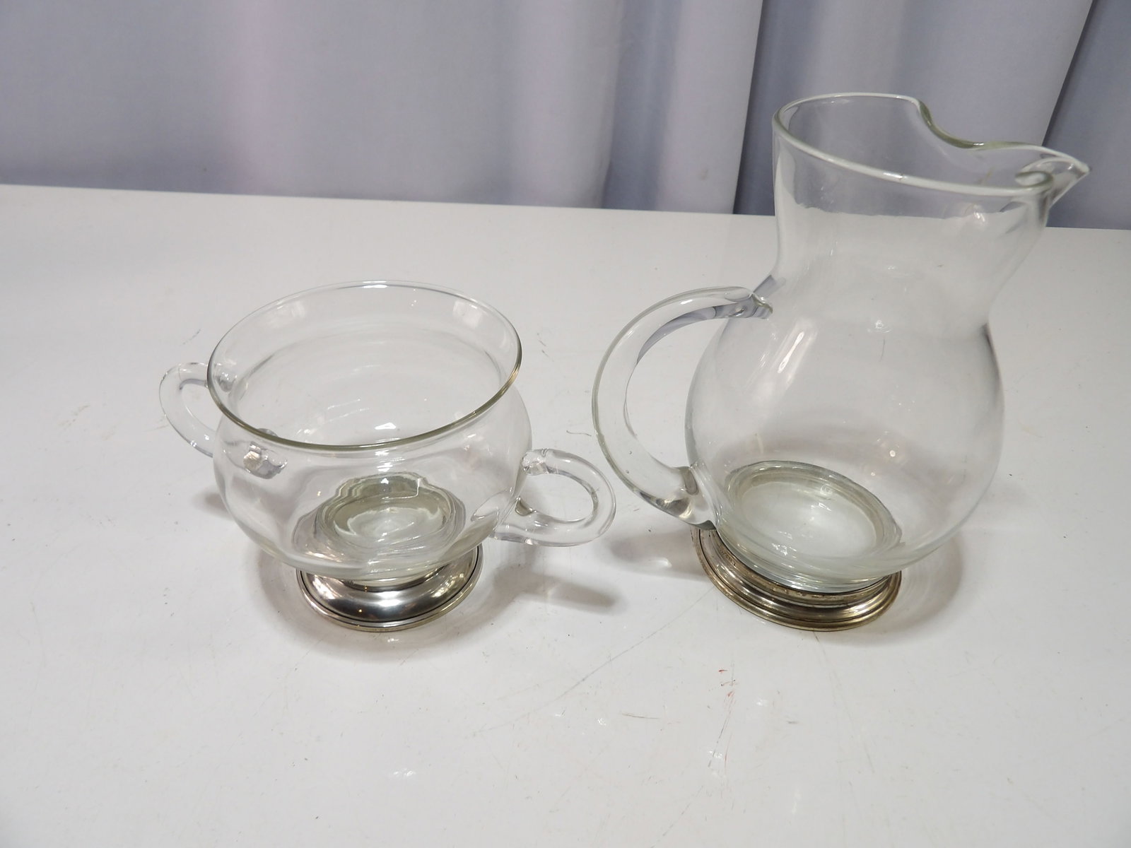 Wallace Sterling Silver and Handblown Glass Creamer and Sugar Set: Vintage Wallace Sterling Silver and Handblown Glass Creamer and Sugar Set. All measurements approximate. Please see photos for condition and details. Selling as is from 04281.