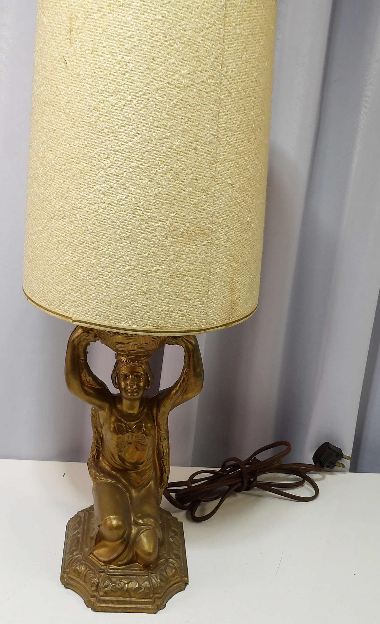 Bronzed Metal Cherub Figure Table Lamp: Vintage Bronzed Metal Cherub Figure Table Lamp with Fabric Shade. All measurements approximate. Please see photos for condition and details. Selling as is from 04281.