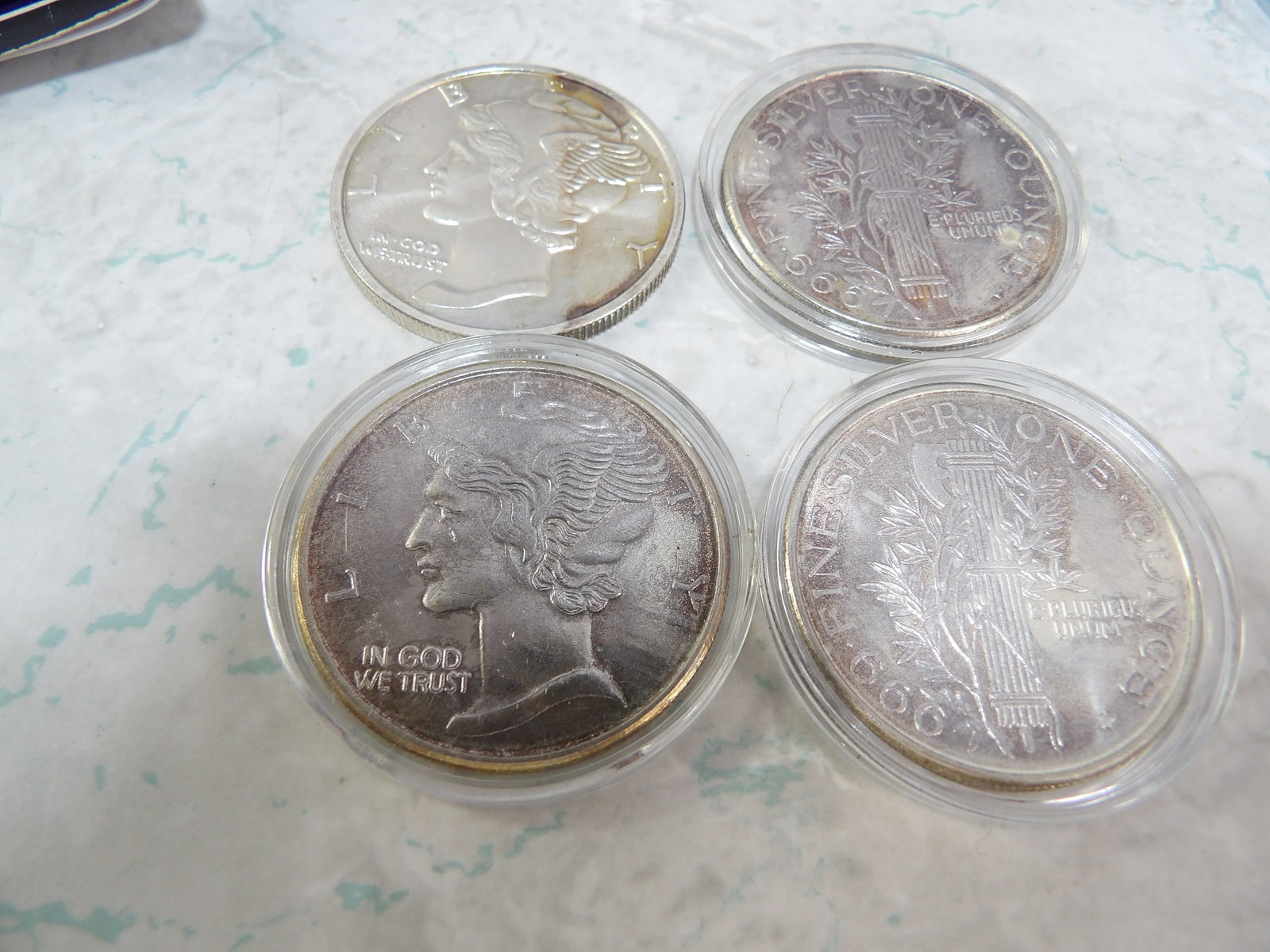 4 Mercury 1 Troy Oz. Silver Rounds: 4 Mercury 1 Troy Oz. Silver Rounds. All measurements approximate. Please see photos for condition and details. Selling as is from 04281.