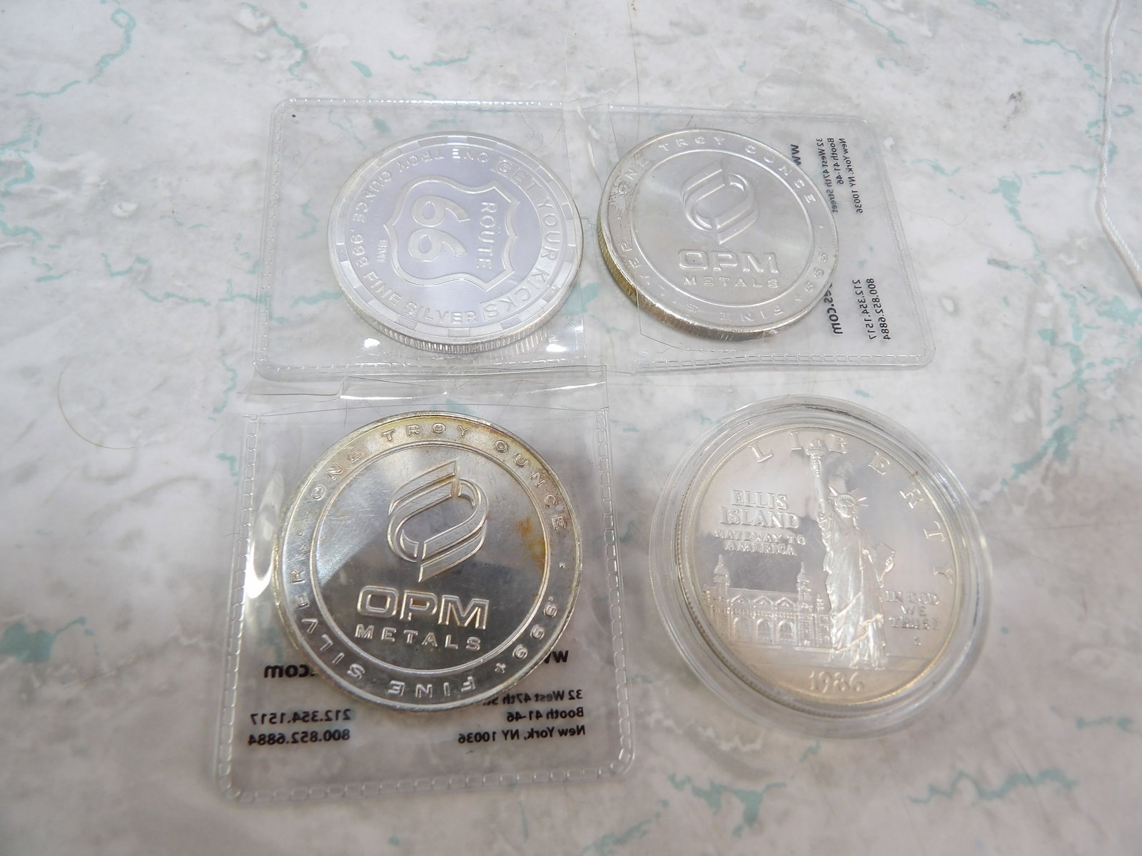 4 1 Troy Oz. Silver Rounds: 4 1 Troy Oz. Silver Rounds, Various Designs. All measurements approximate. Please see photos for condition and details. Selling as is from 04281.
