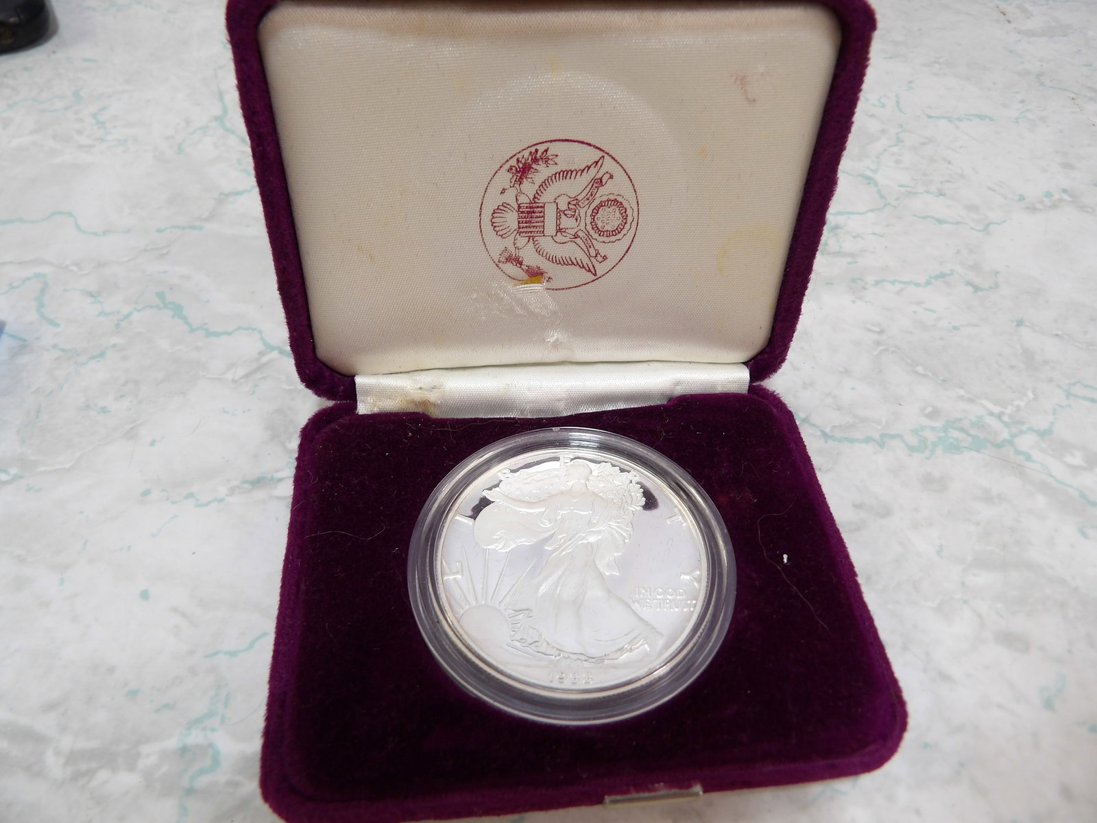 1988 American Eagle, 1 Oz., Silver Proof: 1988 American Eagle, 1 Oz., Silver Proof. All measurements approximate. Please see photos for condition and details. Selling as is from 04281.