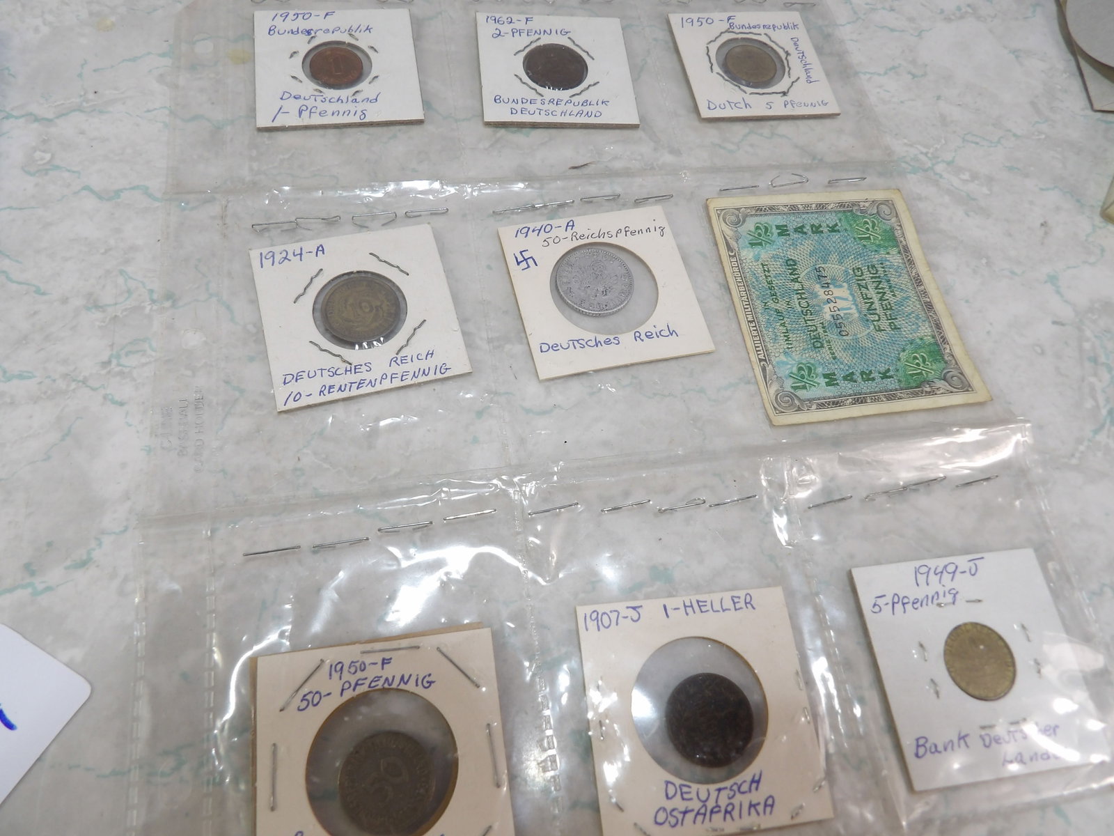 Collection of German & Dutch Coins and Currency: Collection of German & Dutch Coins and Currency from 1907-1962. All measurements approximate. Please see photos for condition and details. Selling as is from 04281.
