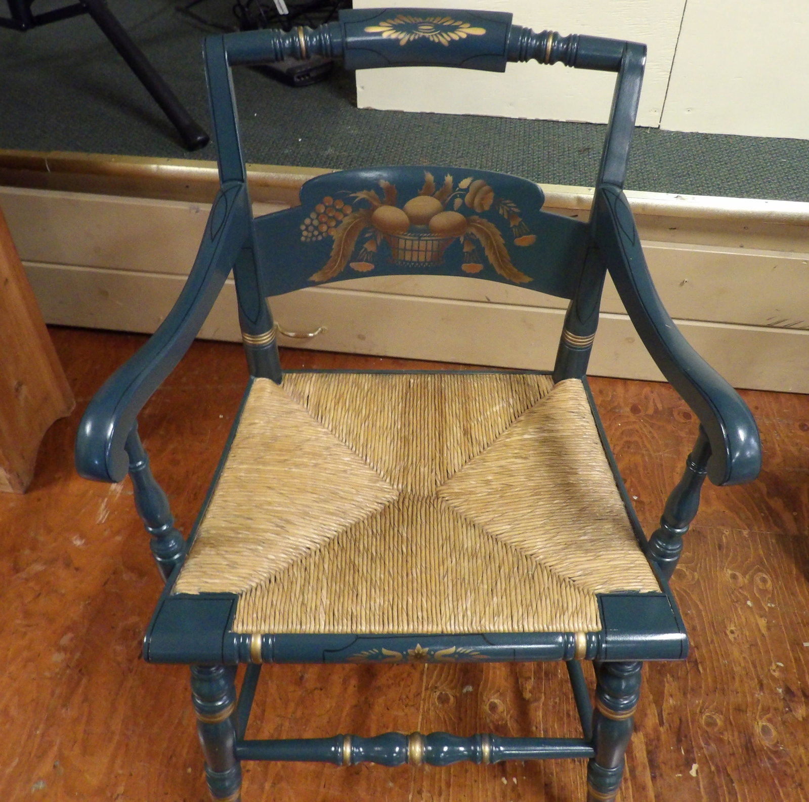 Painted Hitchcock Armchair: Vintage Hitchcock Teal Painted Armchair with Stenciled Fruit and Rush Seat. Perfect Condition. All measurements approximate. Please see photos for condition and details. Selling as is from 04281.