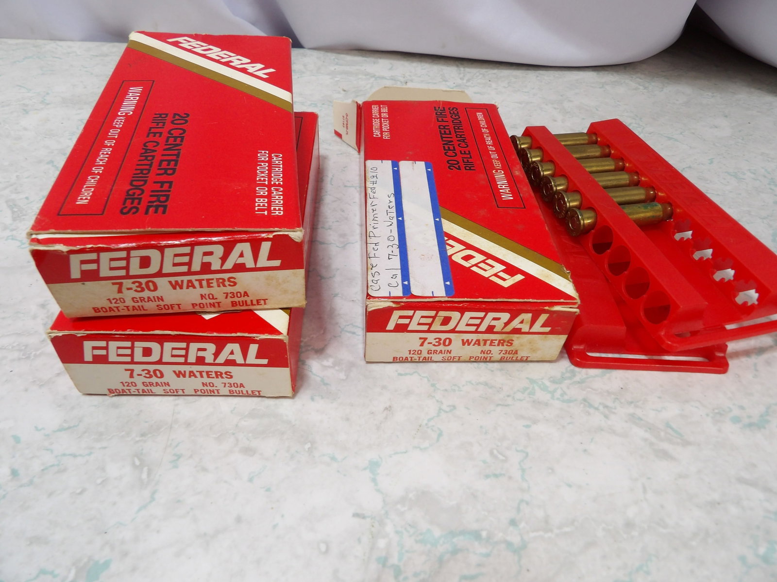 2 Full Boxes Federal Primed Cartridges and 1 Box of Loaded 7-30 Water Bullets: 2 Full Boxes of Federal 7-30 Waters Primed Cartridges and 1 Box of 6 Loaded 7-30 Water Bullets. All measurements approximate. Please see photos for condition and details. Selling as is from 04281.