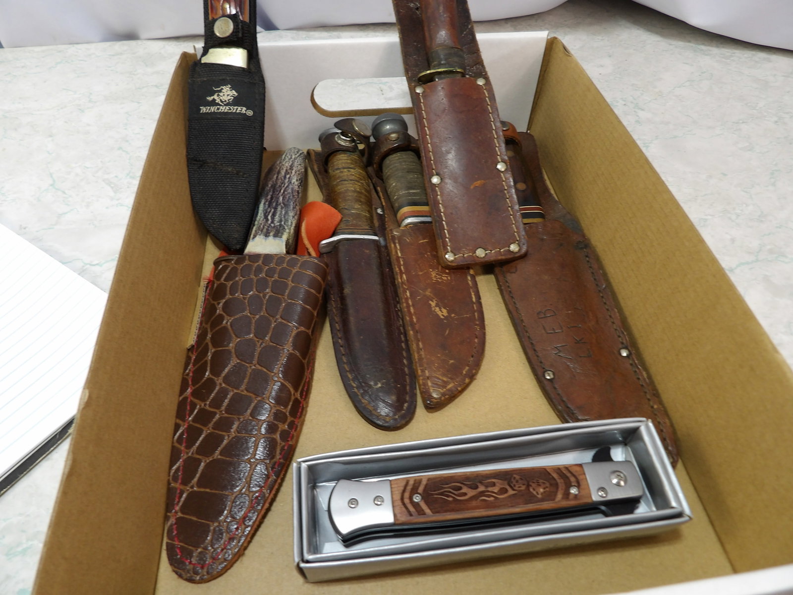 Collection of Vintage Fixed Blade Knives with Sheaths: Collection of Vintage Fixed Blade Knives with Leather Sheaths, Includes 1 Folding Knife. All measurements approximate. Please see photos for condition and details. Selling as is from 04281.