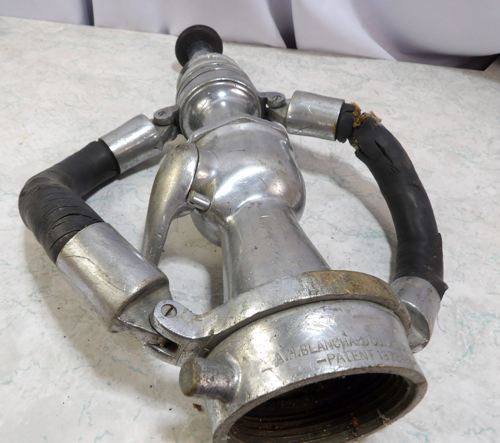 A. H. Blanchard Fire Nozzle with Rubber Handles: Vintage A.H. Blanchard Fire Nozzle with Rubber Handles. All measurements approximate. Please see photos for condition and details. Selling as is from 04281.