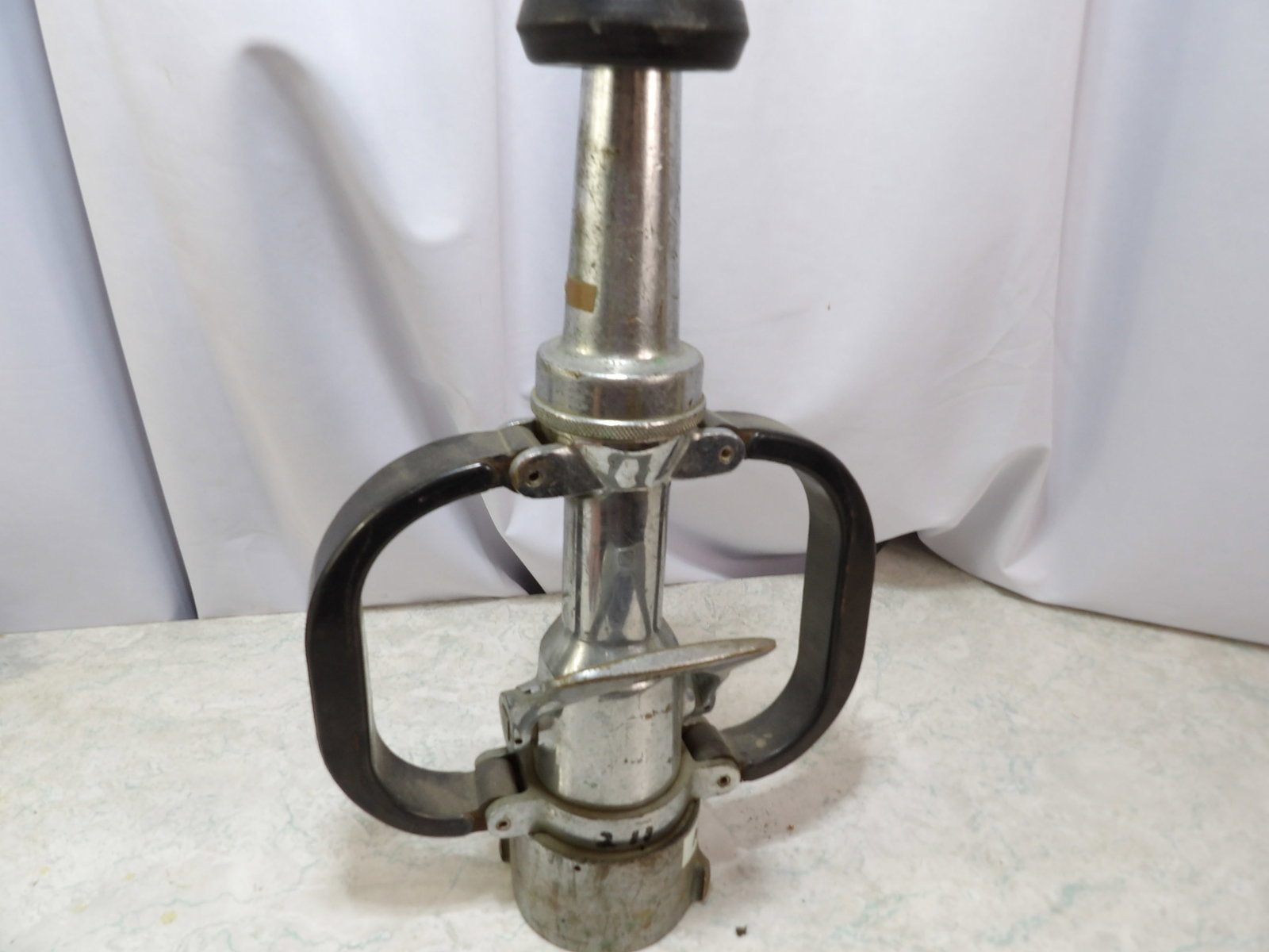 Fire Hose Nozzle with Playpipe Handles: Vintage Firehose Nozzle with Playpipe Handles. All measurements approximate. Please see photos for condition and details. Selling as is from 04281.