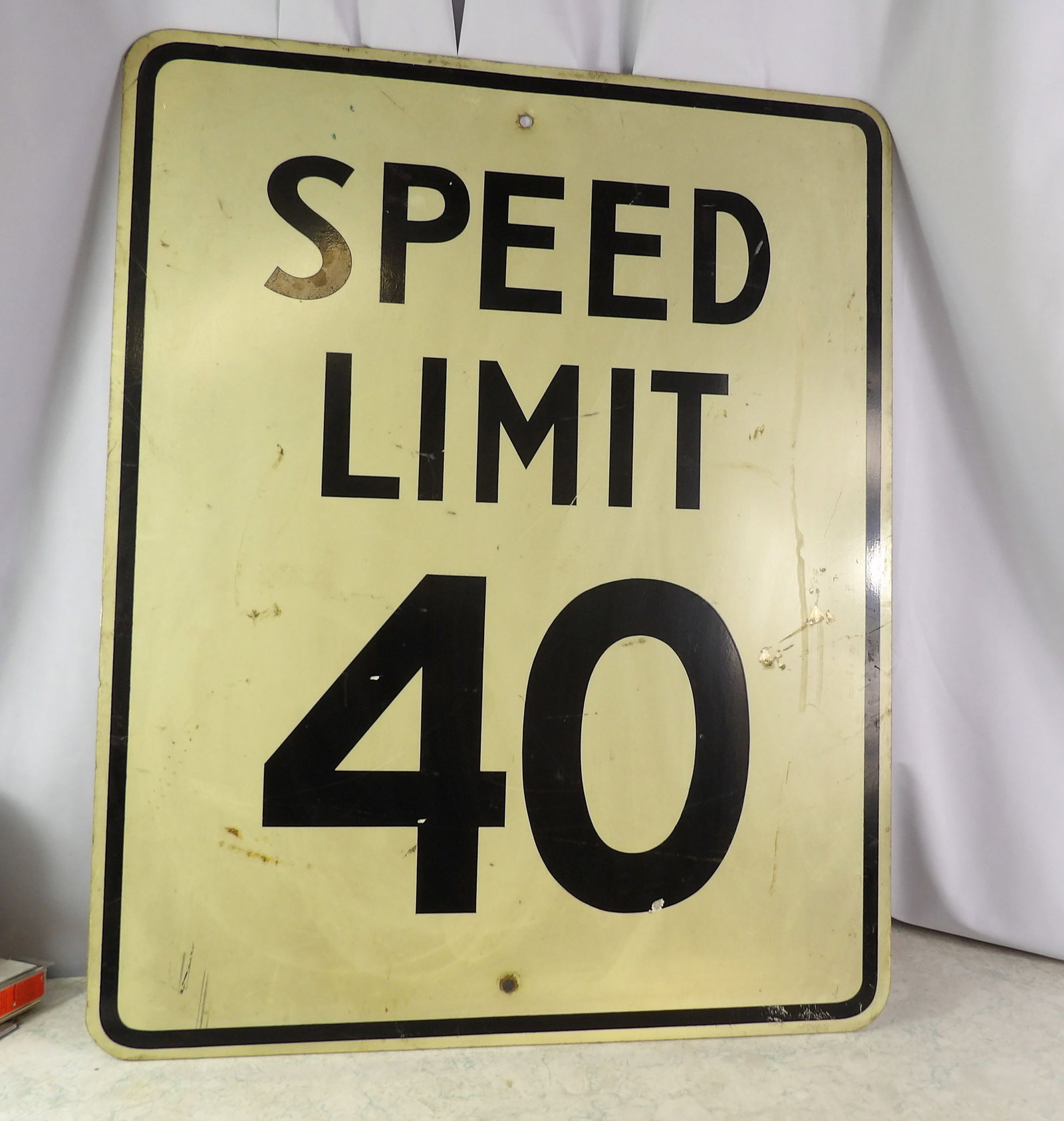Metal Speed Limit Sign: Vintage Metal Speed Limit Sign. 24" X 30". All measurements approximate. Please see photos for condition and details. Selling as is from 04281.
