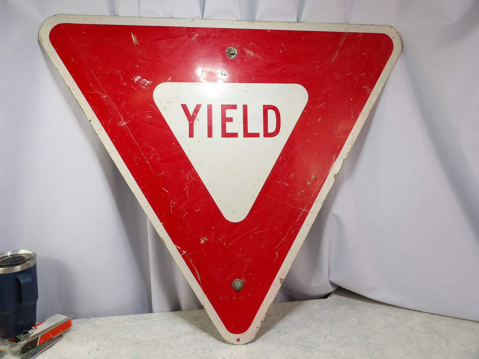 Vintage Yield Sign: 30" Tall Vintage Yield Sign. All measurements approximate. Please see photos for condition and details. Selling as is from 04281.