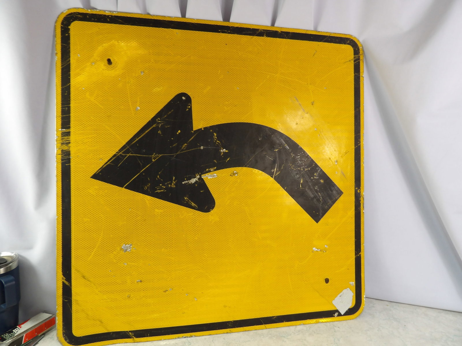 Retired 30" Curved Left Arrow Sign: 30" Authentic Retired Curved Left Arrow Sign. All measurements approximate. Please see photos for condition and details. Selling as is from 04281.
