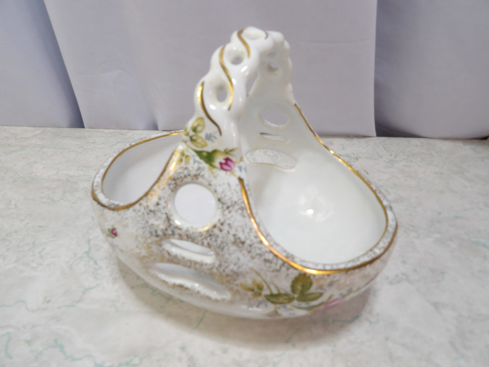 Chodziez Porcelain Basket: Vintage Chodziez Porcelain Basket with Gold Trim and Floral Design. All measurements approximate. Please see photos for condition and details. Selling as is from 04281.
