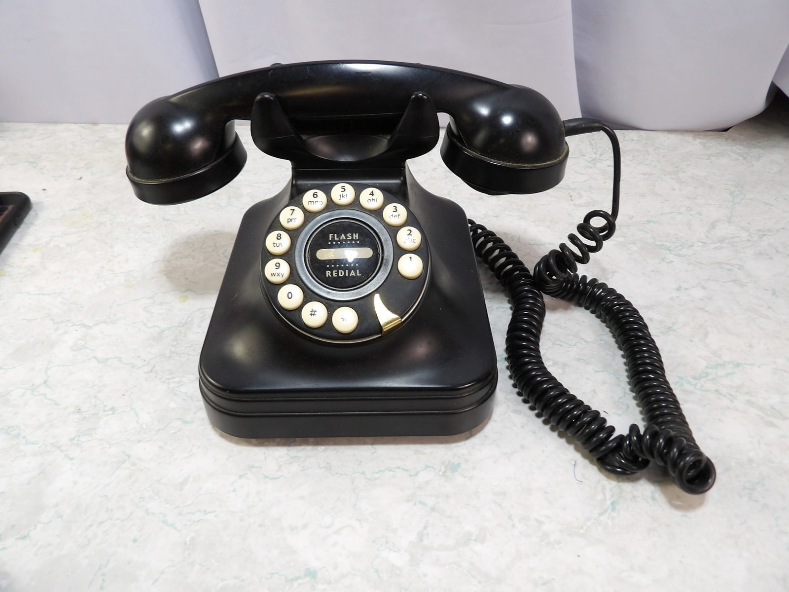 Black Button Touch Retro Style Desk Phone: Vintage Black, Touch Button, Retro Style Desk Phone with Flash Redial. All measurements approximate. Please see photos for condition and details. Selling as is from 04281.