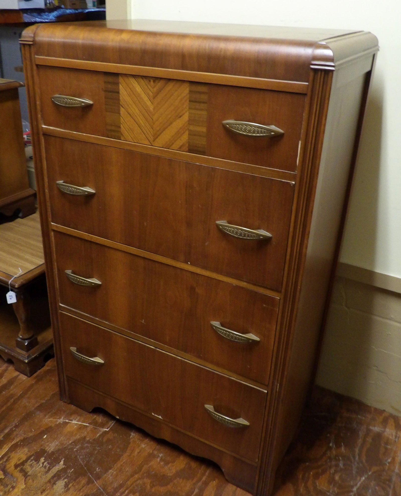 Art Deco Waterfall Dresser: Art Deco Waterfall Dresser with Chevron Inlay and 4 Drawers. All measurements approximate. Please see photos for condition and details. Selling as is from 04281.