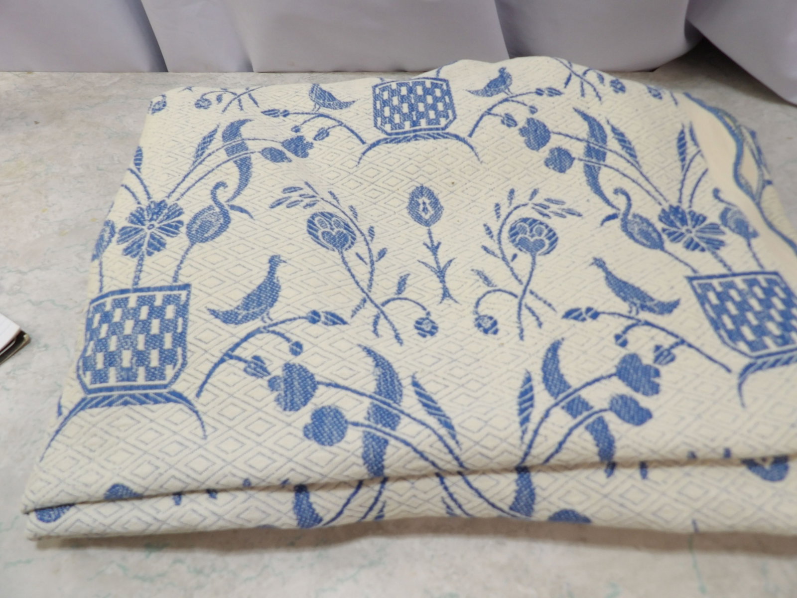 Bed Coverlet or Tablecloth, 6' by 8': 6' X 8' Bed Coverlet or Tablecloth. All measurements approximate. Please see photos for condition and details. Selling as is from 04281.