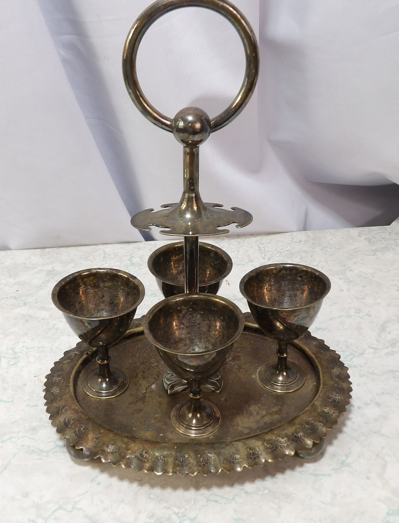 Silver Plated Egg Cruet Set with 4 Cups: Antique Silver Plated Egg Cruet Set with 4 Cups. Along with LiveShip (handled by LiveAuctioneers), we also can have a local shipper package and ship your purchases. Just choose buyer arranges