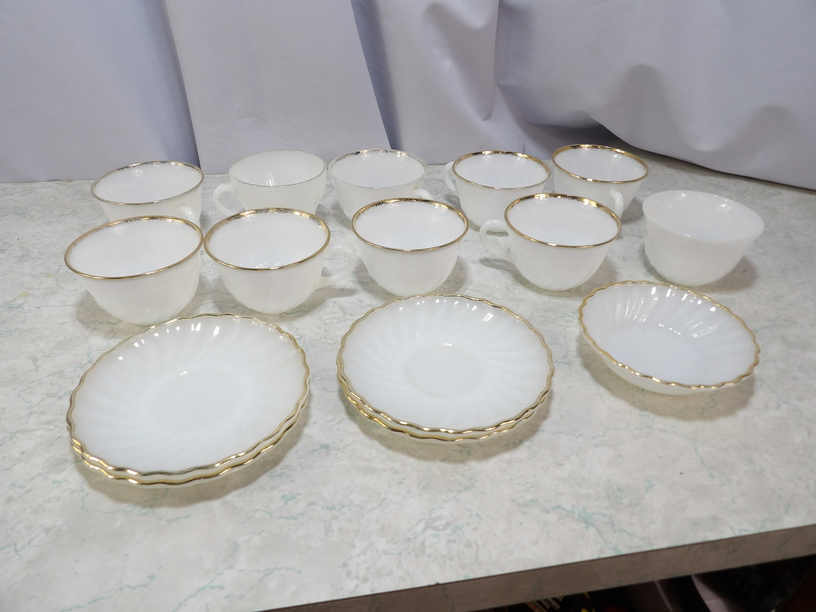 15 Pieces Vintage Anchor Hocking White Milk Glass Cups and Saucers: Vintage Anchor Hocking Fire-King White Milk Glass 10 Cups and 5 Saucers. Along with LiveShip (handled by LiveAuctioneers), we also can have a local shipper package and ship your purchases. Just choose