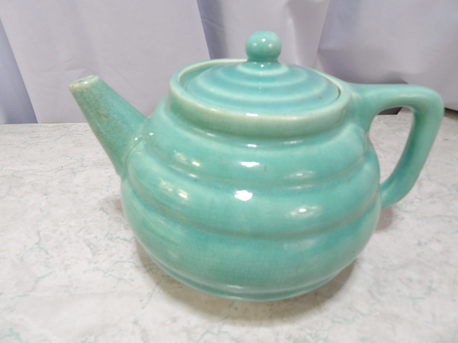 Jade Green Ringware Ceramic Tea Pot: Vintage Jade Green Ringware Ceramic Tea Pot. Along with LiveShip (handled by LiveAuctioneers), we also can have a local shipper package and ship your purchases. Just choose buyer arranges shipping on