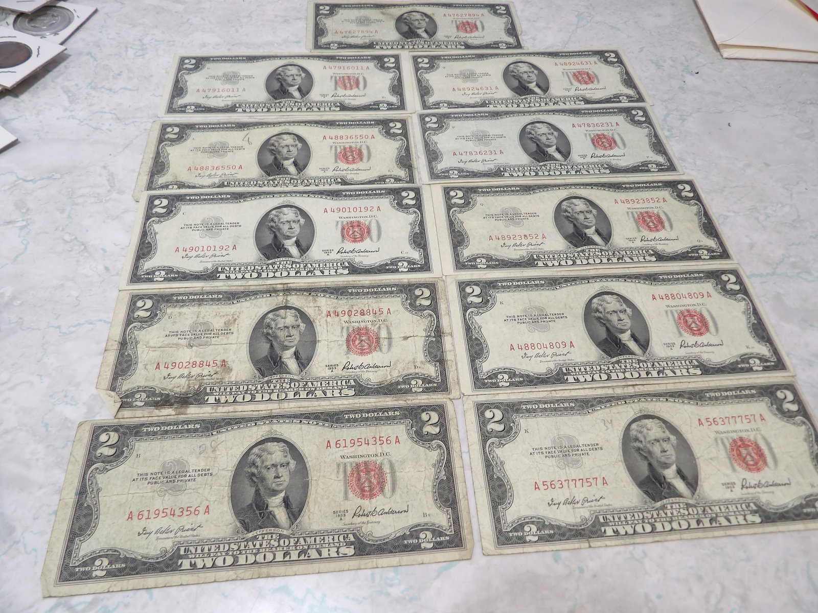 Collection of 11 1953A Red Seal $2 Bills (1 of 3)