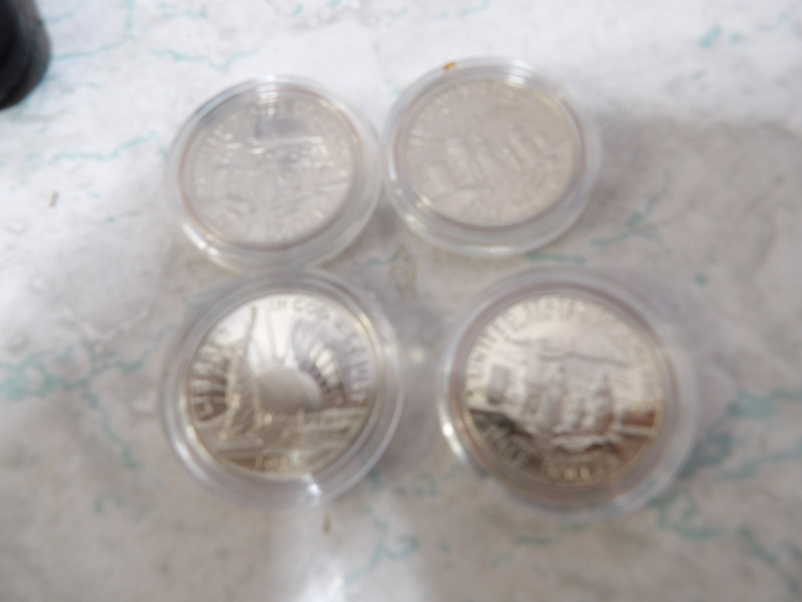 4 Piece Set 1986 Statue of Liberty Half Dollar Commemorative Proof Set: 4 Piece Set 1986 Statue of Liberty Half Dollar Commemorative Proof Set. Half Dollar 90% Silver. Along with LiveShip (handled by LiveAuctioneers), we also can have a local shipper package and ship your