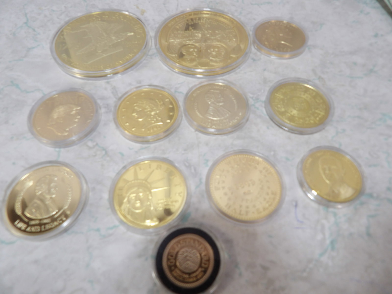 Collection of Twelve 24Kt Gold Plated Commemorative Tribute Coins (1 of 3)