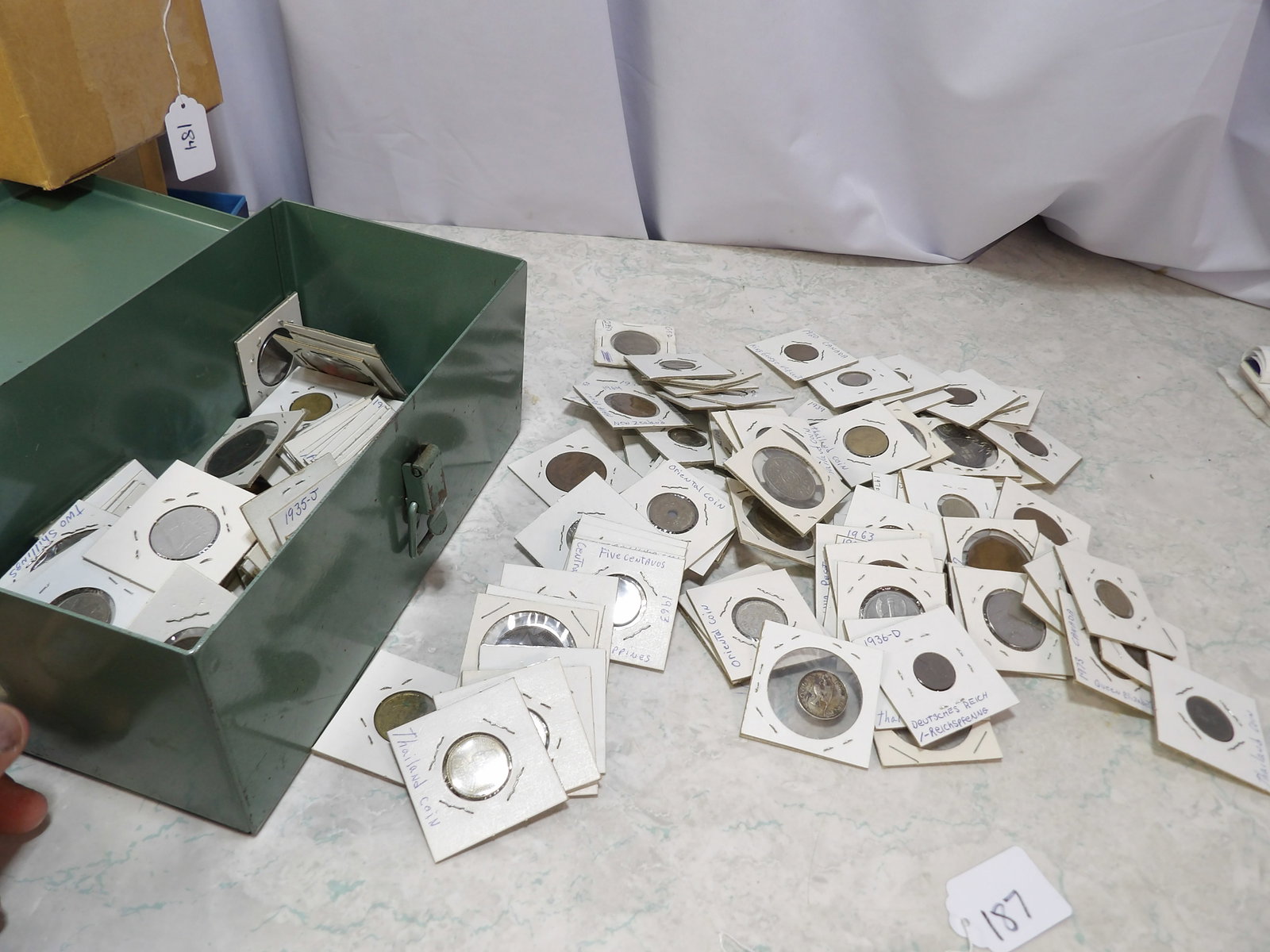 Large Collection of World Coins: Large Collection of World Coins in Cardboard Flips. Along with LiveShip (handled by LiveAuctioneers), we also can have a local shipper package and ship your purchases. Just choose buyer arranges shipp