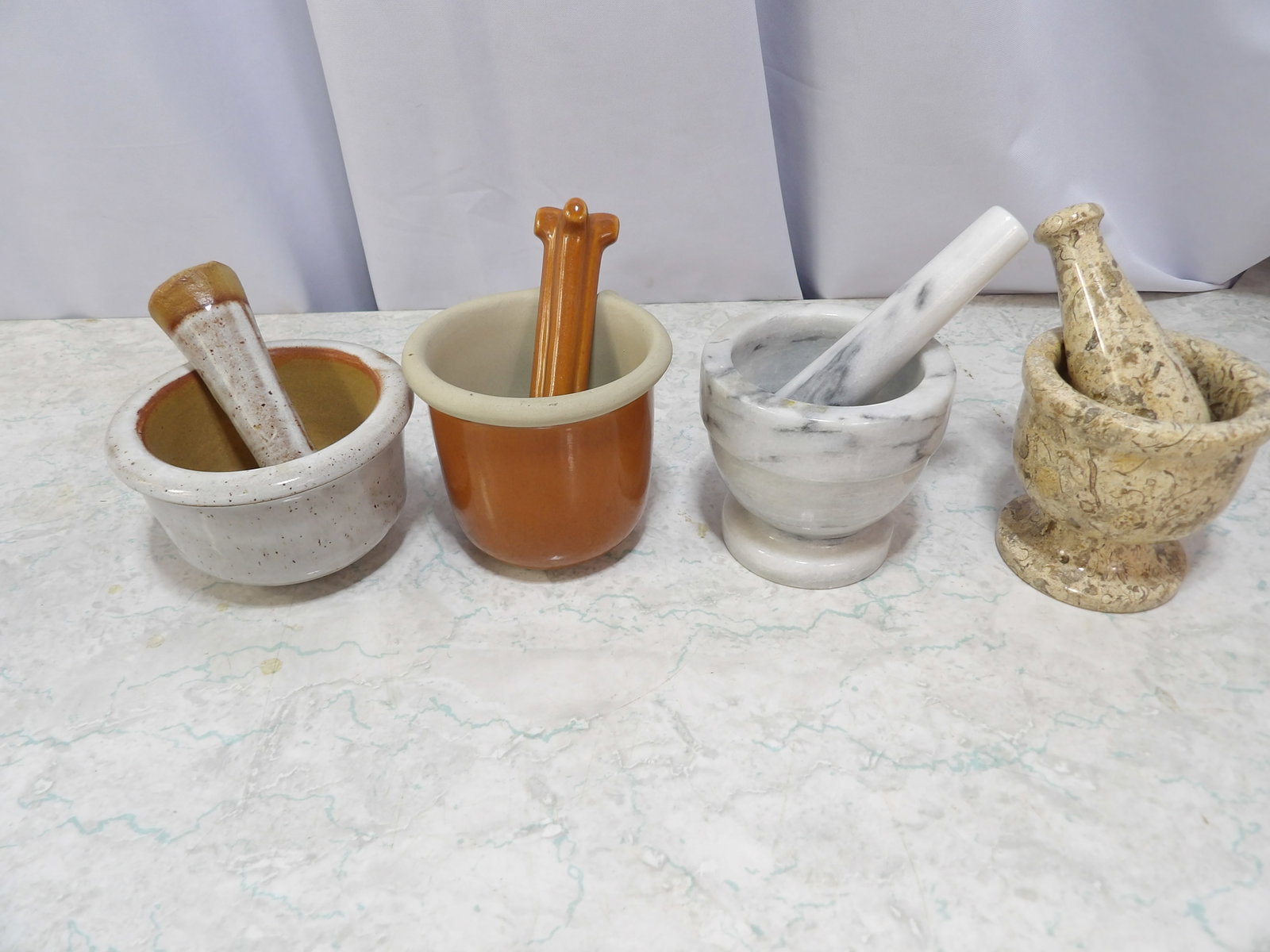 Collection of 4 Assorted Mortar and Pestle Kitchen Sets: Collection of 4 Assorted Vintage Mortar and Pestle Kitchen Sets. Along with LiveShip (handled by LiveAuctioneers), we also can have a local shipper package and ship your purchases. Just choose buyer a