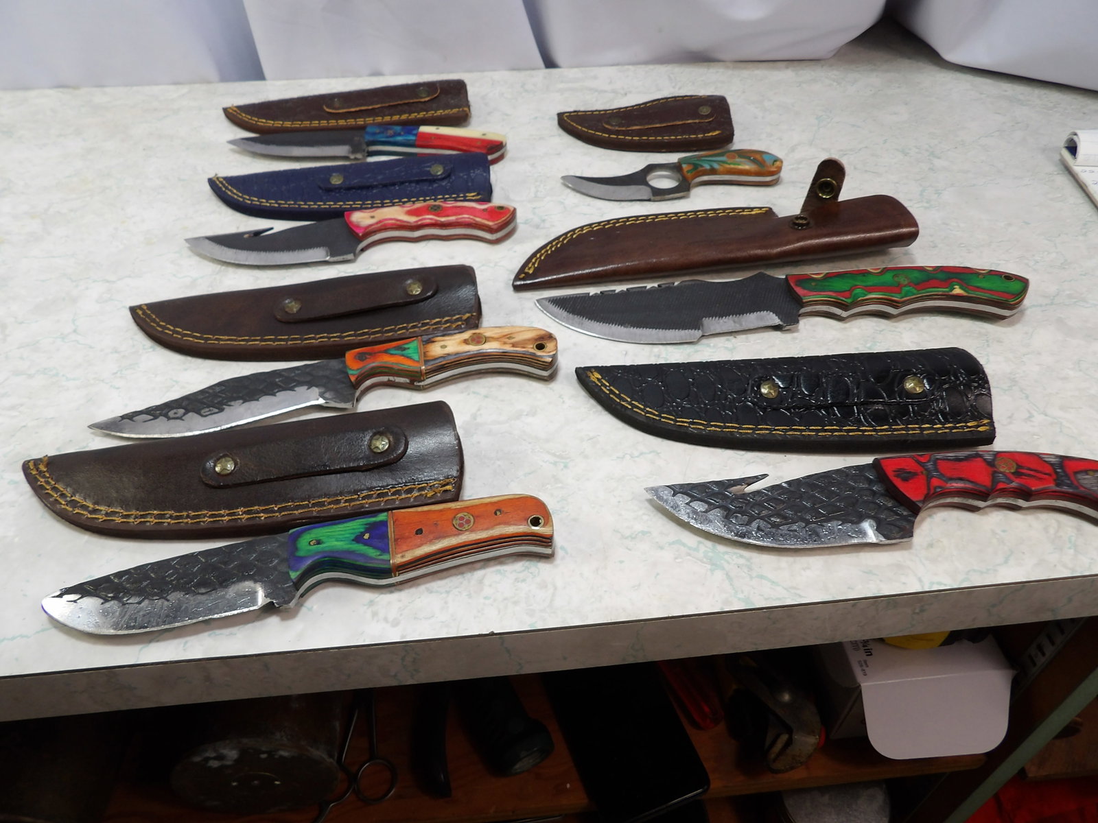 Lot of 7 Steel Knives with Leather Sheaths: Lot of 7 Handmade Steel Knives with Leather Sheaths. Along with LiveShip (handled by LiveAuctioneers), we also can have a local shipper package and ship your purchases. Just choose buyer arranges