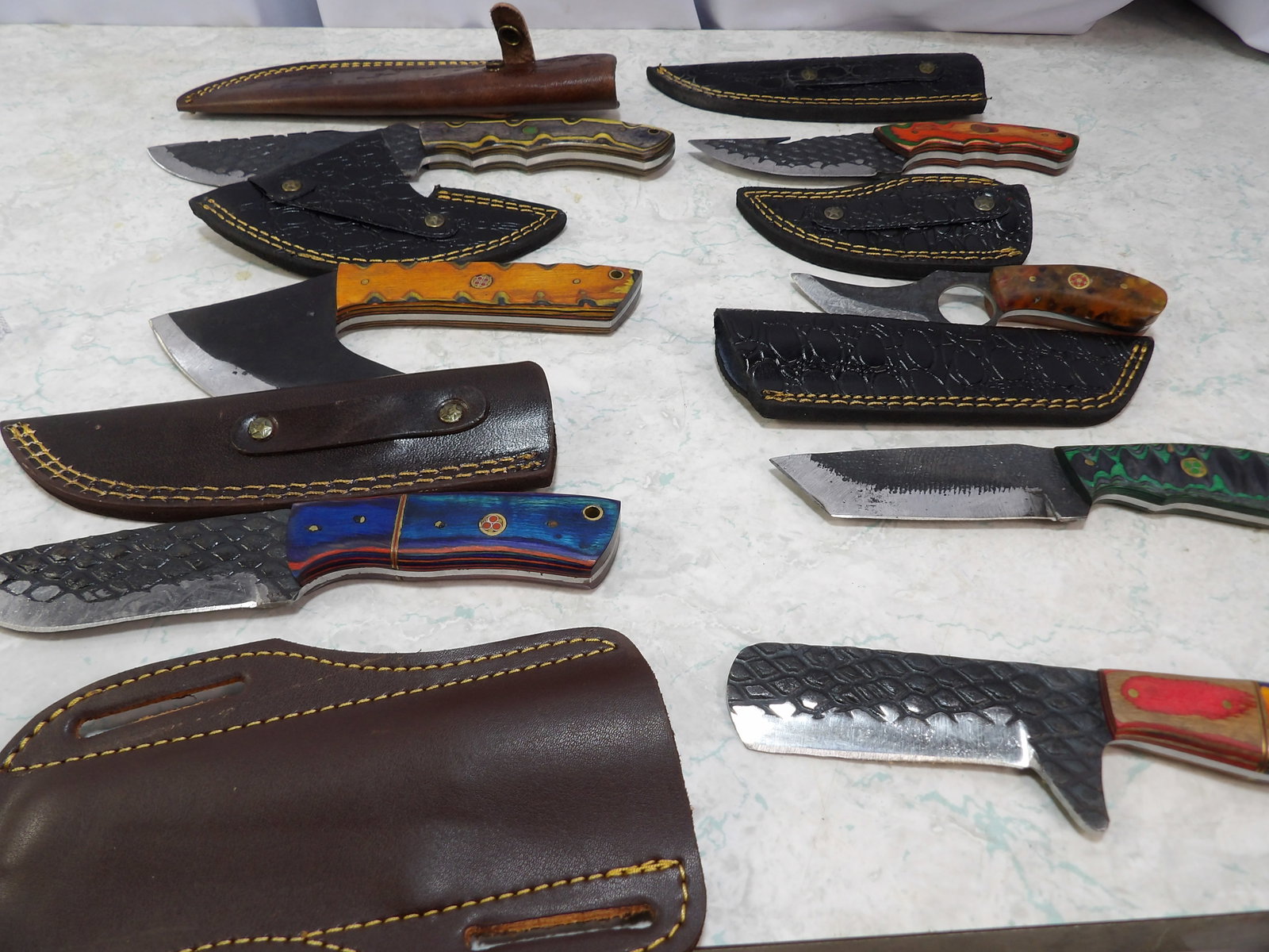 Lot of 7 Steel Knives with Leather Sheaths: Lot of 7 Handmade Steel Knives with Leather Sheaths. Along with LiveShip (handled by LiveAuctioneers), we also can have a local shipper package and ship your purchases. Just choose buyer arranges