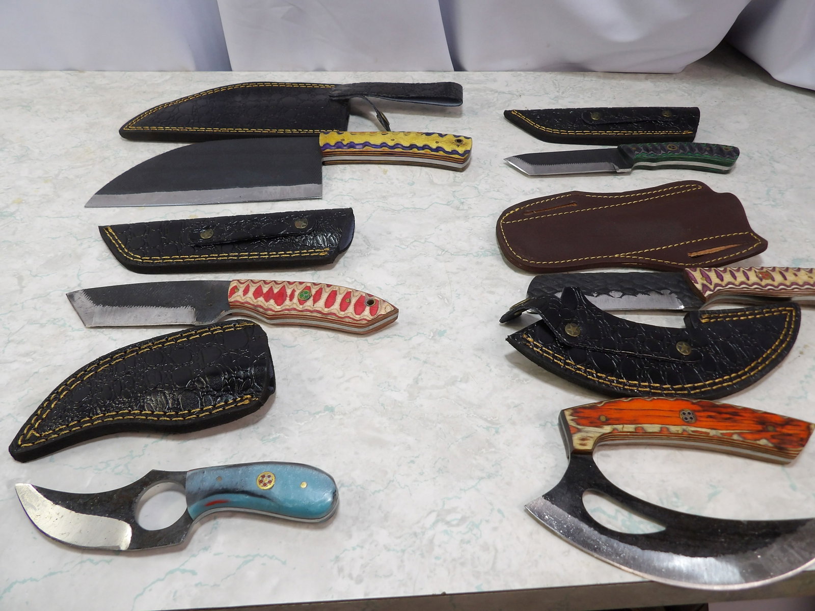 Lot of 6 Steel Knives with Sheaths: Lot of 6 Handmade Steel Knives with Leather Sheaths. Along with LiveShip (handled by LiveAuctioneers), we also can have a local shipper package and ship your purchases. Just choose buyer arranges