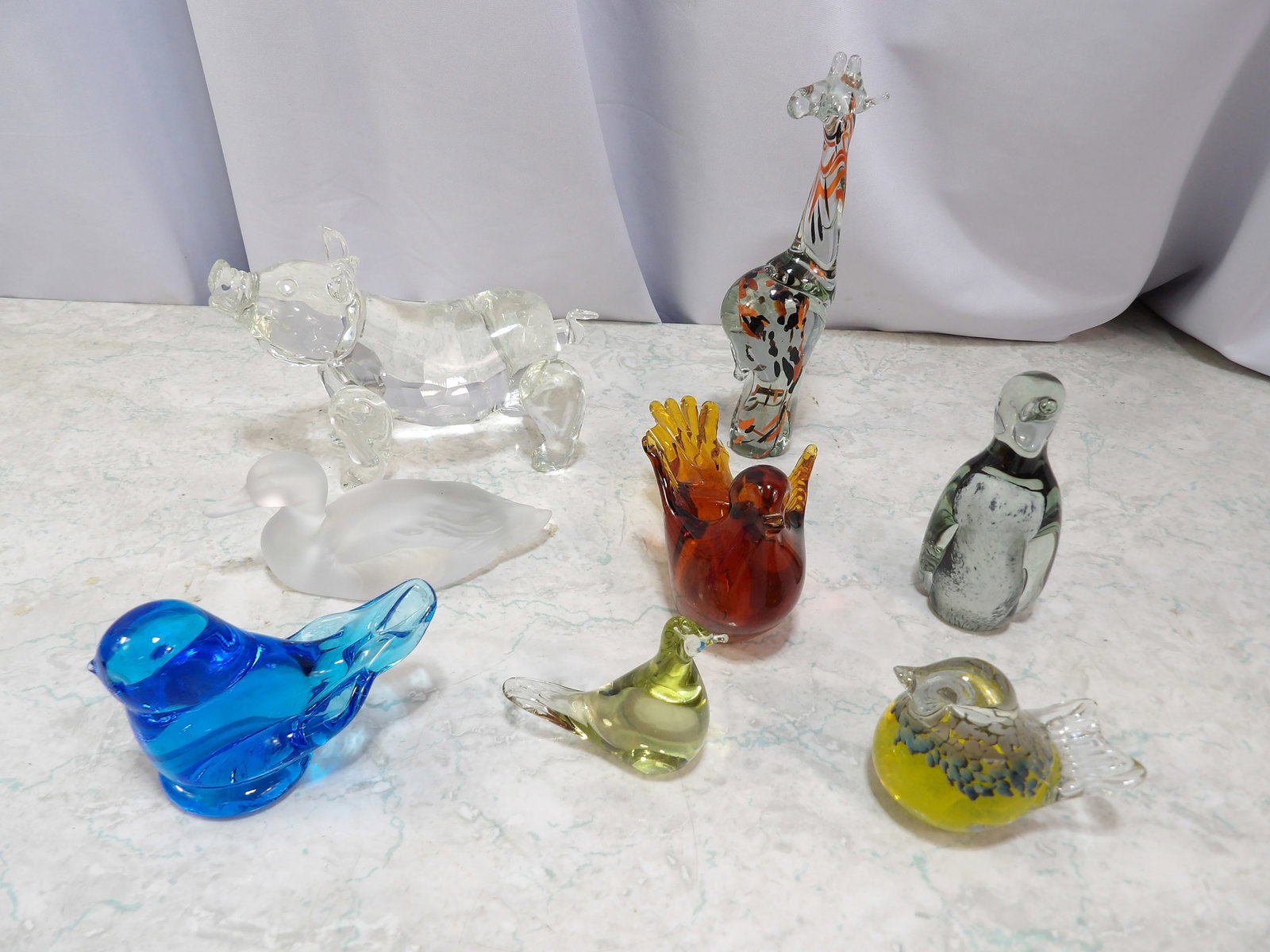 Collection of 8 Handblown Art Glass Figurines: Collection of 8 Assorted Vintage Hand Blown Art Glass Figurines. Along with LiveShip (handled by LiveAuctioneers), we also can have a local shipper package and ship your purchases. Just choose buyer