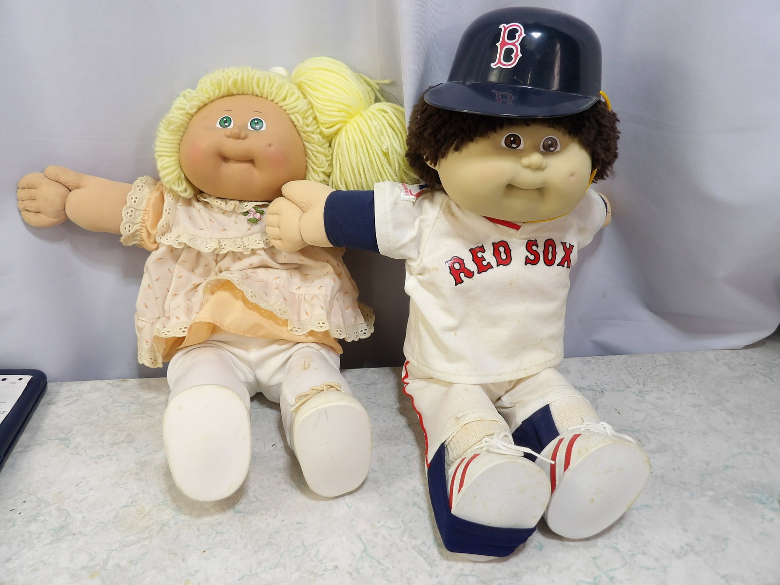 Pair of Full Size Cabbage Patch Kids Dolls, 1980's: Pair of Vintage 1980's Full Size Cabbage Patch Kids Dolls in Original Clothes. Along with LiveShip (handled by LiveAuctioneers), we also can have a local shipper package and ship your purchases. Just