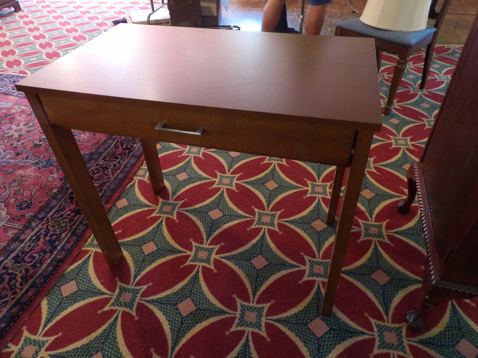 Solid Wood Writing Desk with Single Drawer: Mid Century Modern Style Solid Wood Writing Desk with Single Drawer. 20" Deep X 34" Wide. Along with LiveShip (handled by LiveAuctioneers), we also can have a local shipper package and ship your