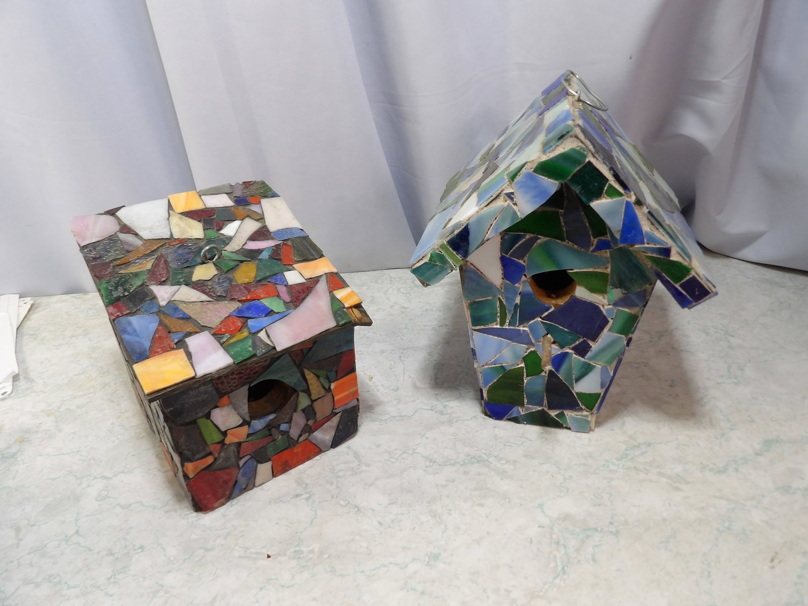 Set of Two Handcrafted Decorative Mosaic Birdhouses: Set of Two Handcrafted Decorative Mosaic Birdhouses. Along with LiveShip (handled by LiveAuctioneers), we also can have a local shipper package and ship your purchases. Just choose buyer arranges