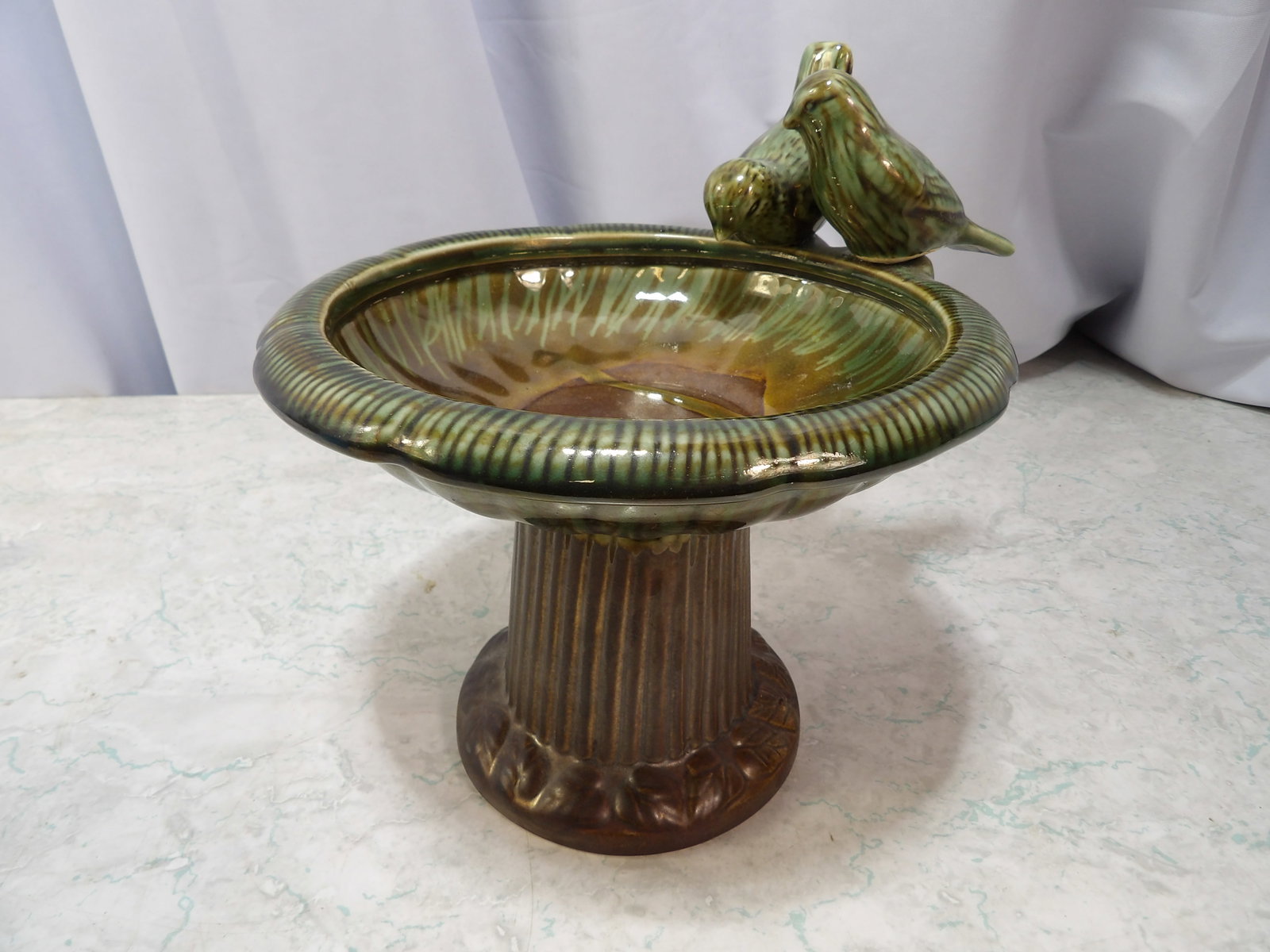 Vintage Glazed Ceramic Bird Bath: Vintage Glazed Ceramic Bird Bath. Two birds. Table top. Along with LiveShip (handled by LiveAuctioneers), we also can have a local shipper package and ship your purchases. Just choose buyer arranges