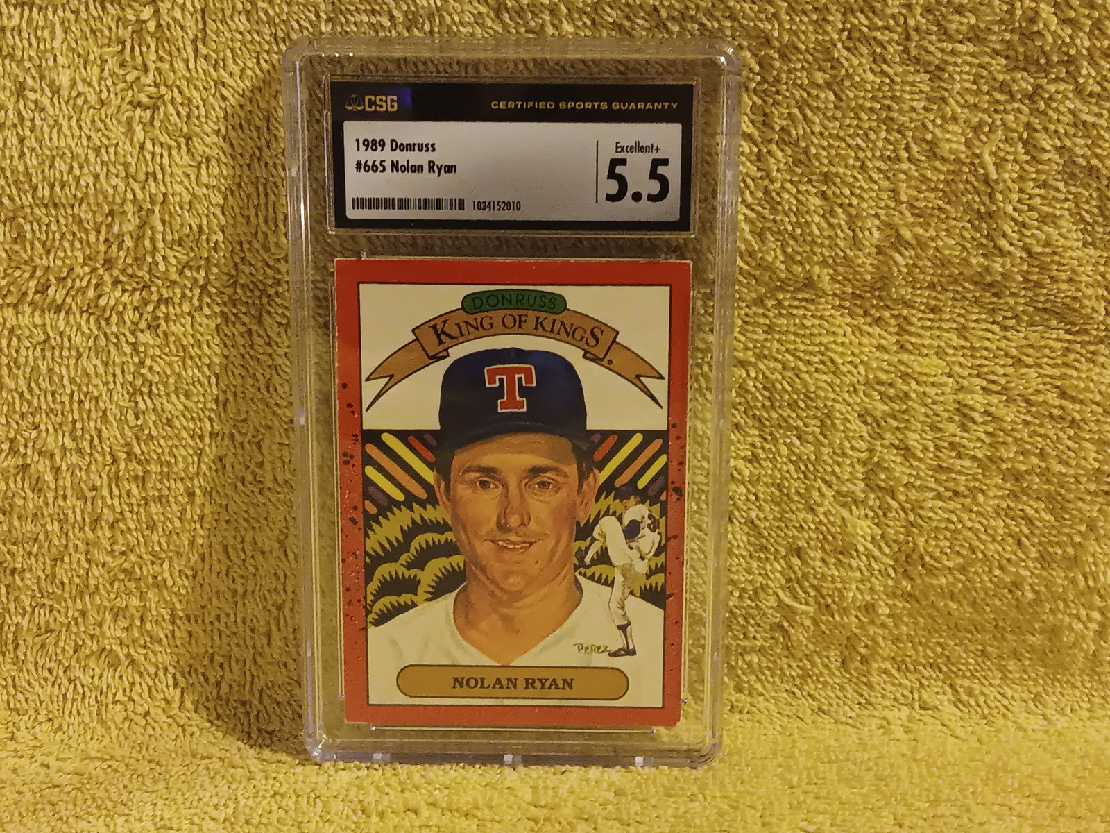 1989 Donruss # 665 Nolan Ryan Graded 5.5 By CSG 1034152010 "I Do In-House Shipping": Up for auction is a old vintage baseball card 1989 Donruss # 665 Nolan Ryan 1034152010, and the Case has light scuff marks. Also check out the pictures they our part of the description.