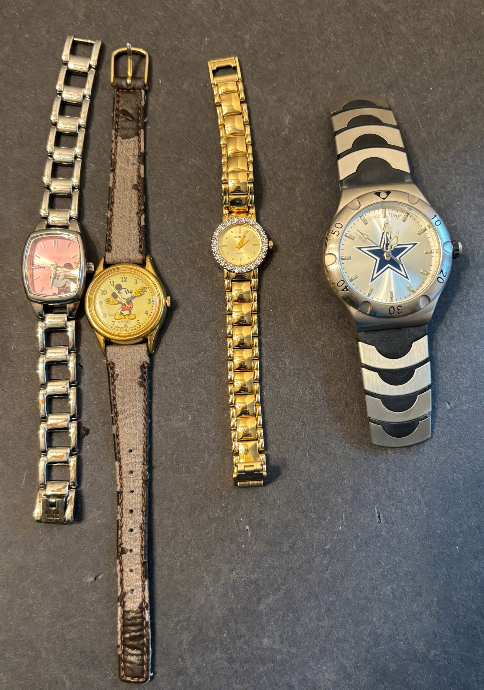 Watch Lot: 4 total watches including Disney MU147, 1970s Lorus Disney V5156080, Gruen Ladies fashion watch and a Cowboy face(Game Time)