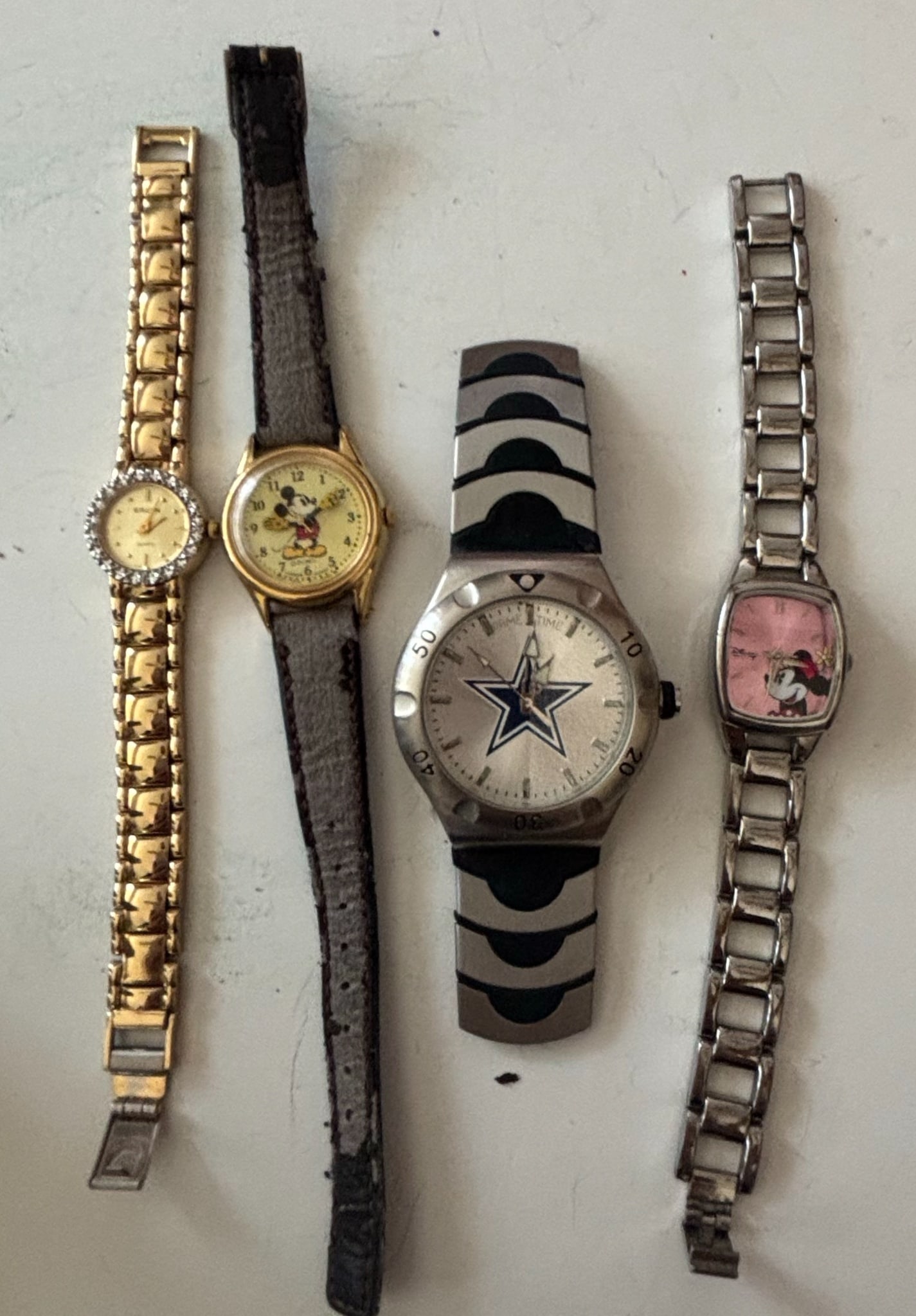 Lot of Four Assorted Wristwatches: GRUTN, Mickey Mouse, Dallas Cowboys Game Time, Minnie Mouse (1 of 4)