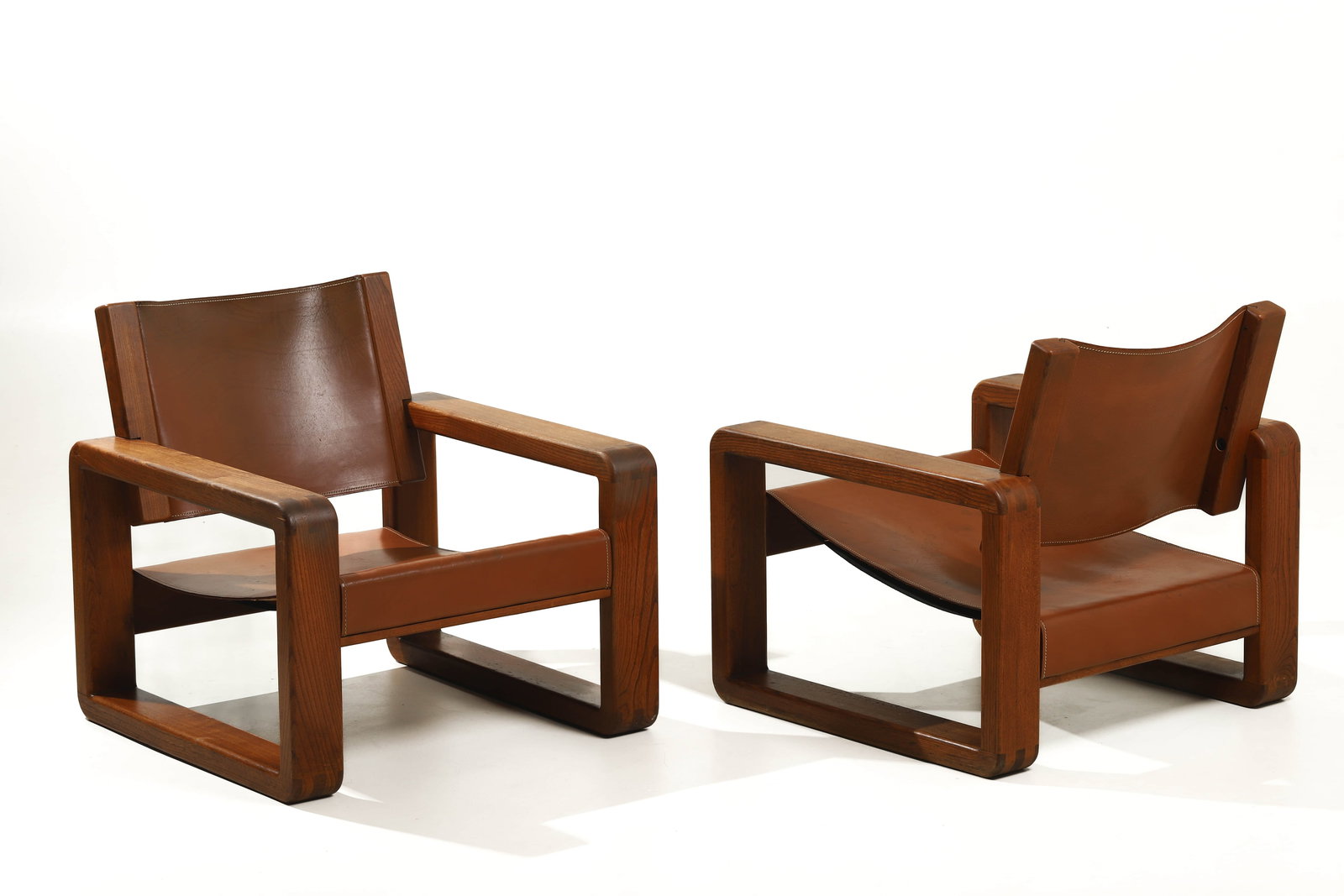 PAIR OF MID-CENTURY MODERN OAK AND LEATHER LOUNGE CHAIRS (1 of 7)