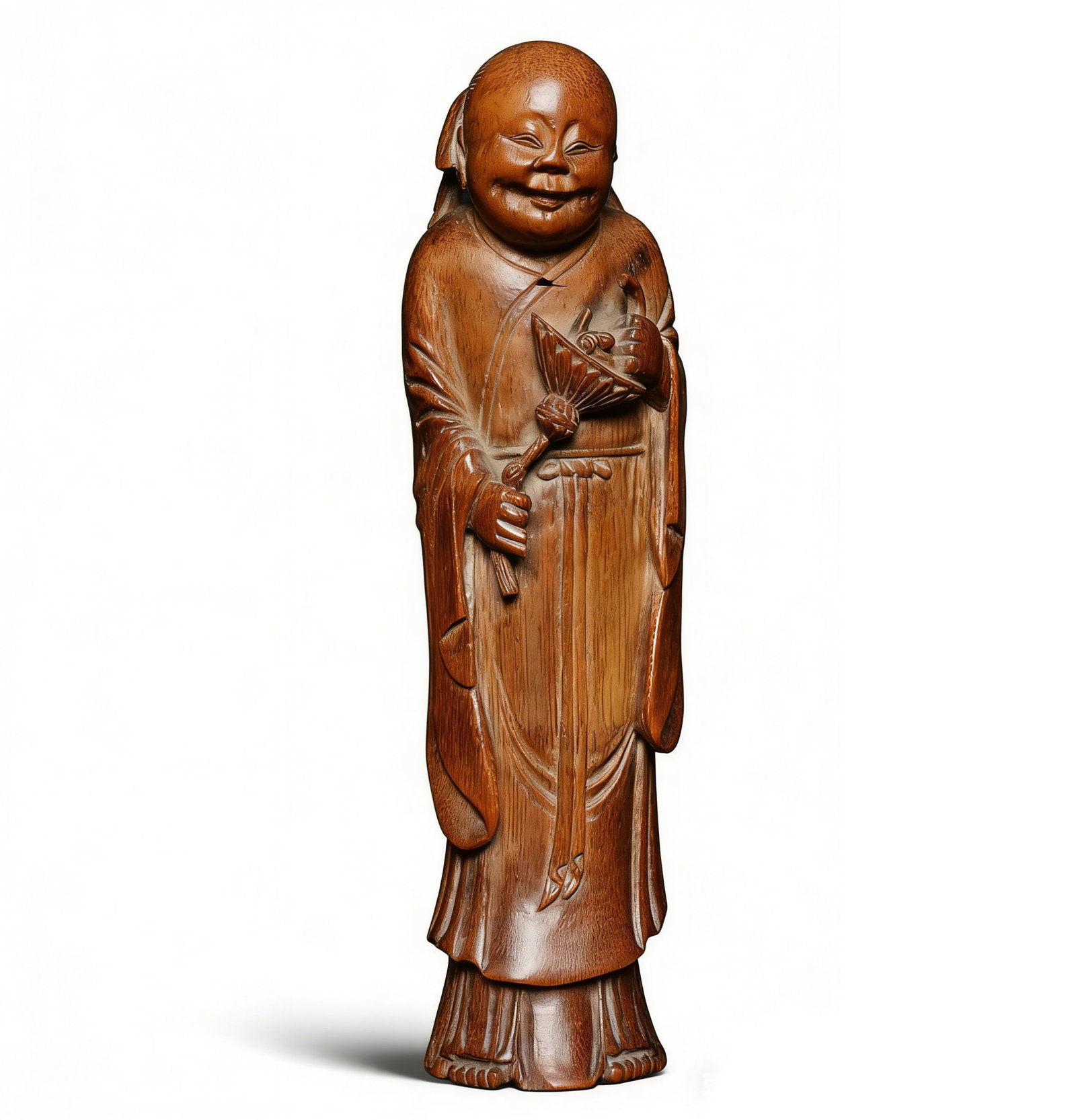 Qing Dynasty Bamboo Carved Statue of Liu Hai Playing with the Golden Toad: H:24cm W:6.5cm This is a Qing Dynasty bamboo carved statue of Liu Hai playing with the golden toad, a fine literati bamboo carving piece. Carved from natural bamboo, it has clear bamboo grain and warm