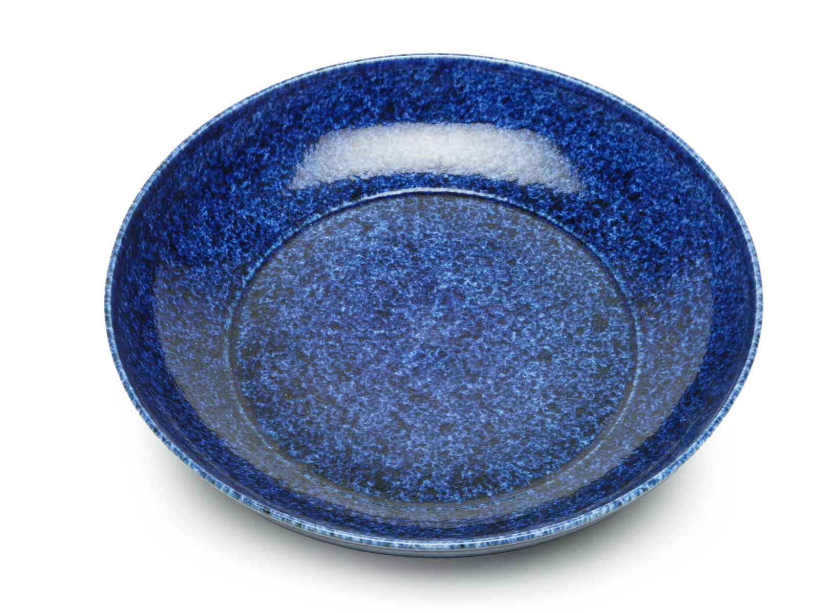 Ming Xuande Period Sgraffito Blue-Glazed Plate: H:6cmW:29.5cm This is a sgraffito blue-glazed plate from the Xuande period of the Ming Dynasty, a precious monochrome-glazed treasure of the Ming imperial kiln. The plate features an open mouth,