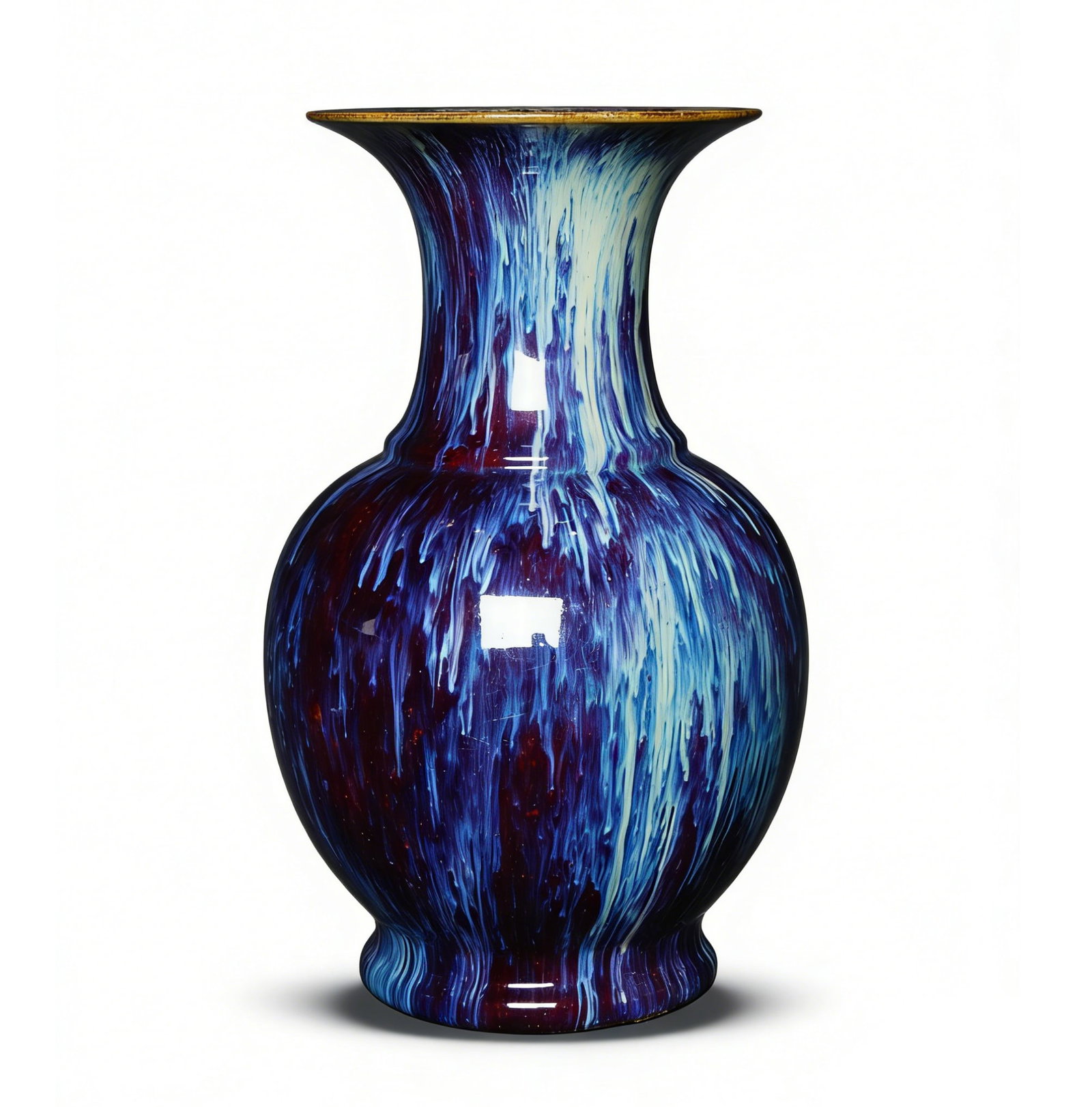 Qing Dynasty Flambé-Glazed Bottle with Flared Mouth: H:42cmW:24cm This is a Qing Dynasty flambé-glazed bottle with a flared mouth, a fine colored-glaze porcelain piece. Shaped with a flared mouth, constricted neck, bulging belly, and ring foot, the for