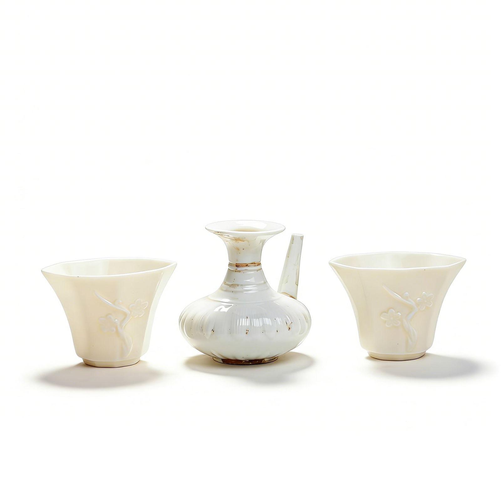 Qing Dynasty White-Glazed Carved Plum-Pattern Wine Ewer & Cups (A Set) (1 of 11)