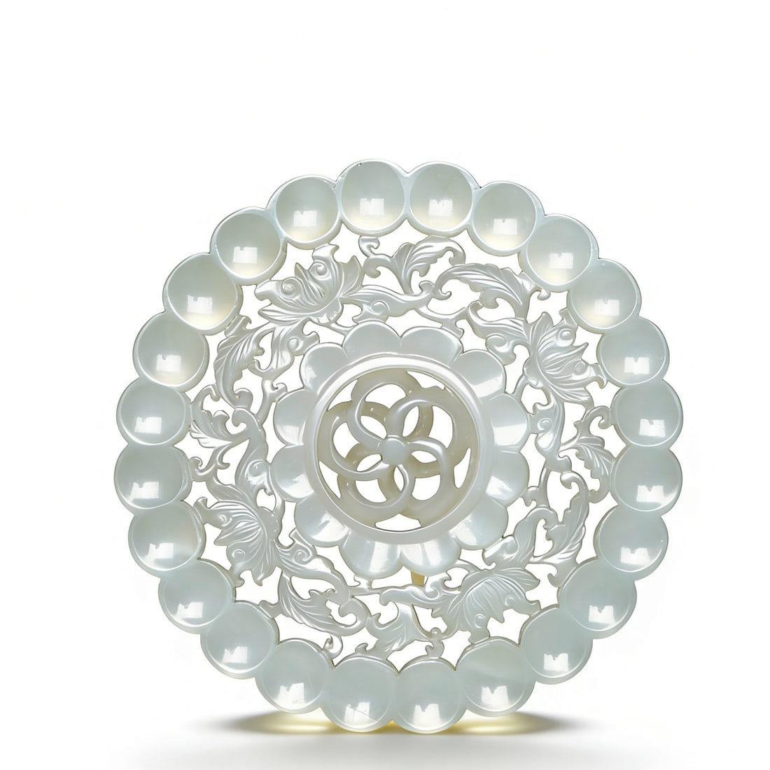 Qing Dynasty Hetian White Jade Multi-Layer Openwork Revolving Plaque with Floral Patterns: D:7.5cm This is a Qing Dynasty Hetian white jade multi-layer openwork revolving plaque with floral patterns, a peak work of jade craftsmanship. Carved from Hetian white jade with pure, luminous textur