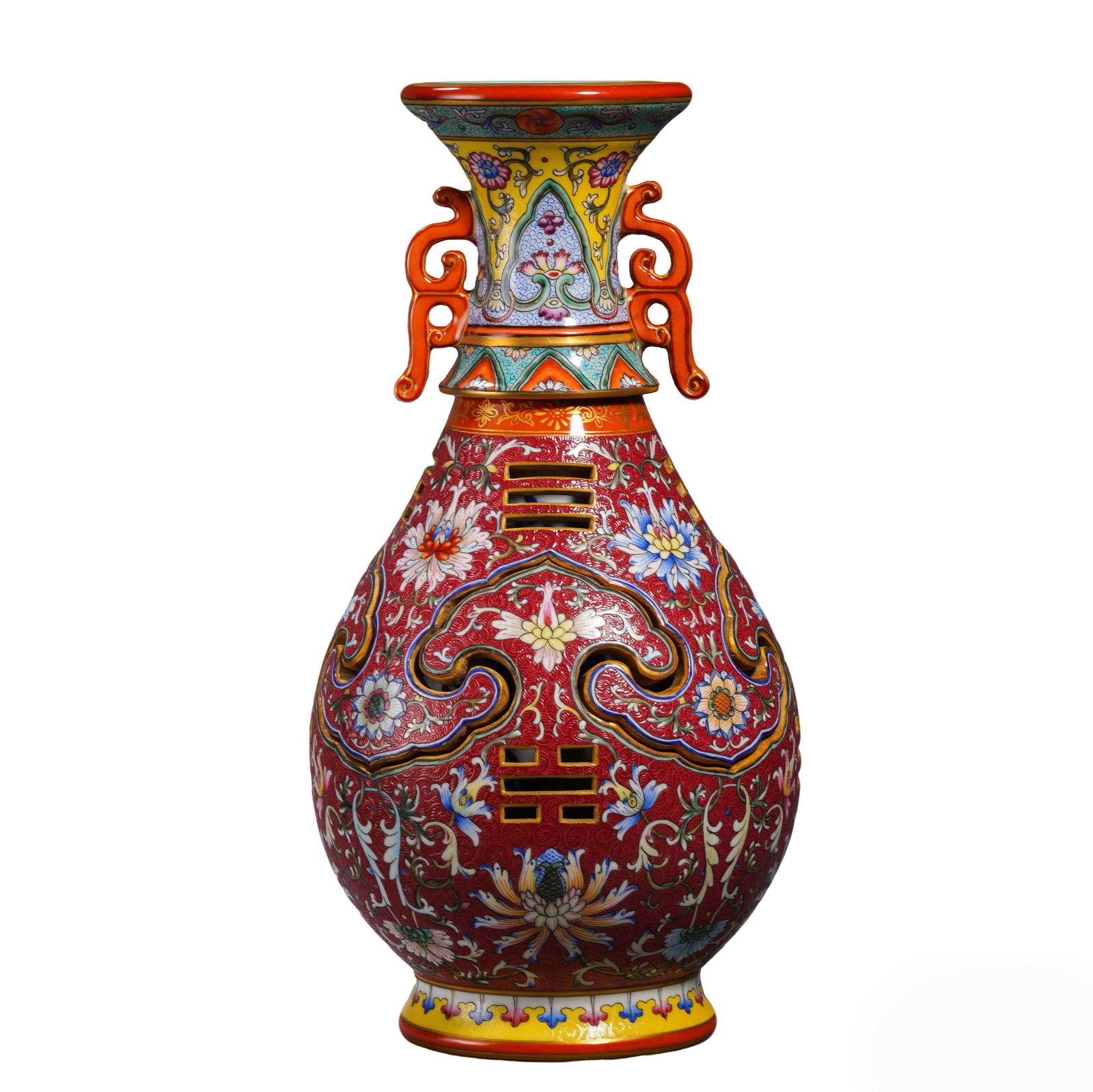 Qing Qianlong Period Famille Rose Yuhuchun Vase: H:33cmW:16cm This is a Qing Qianlong period famille rose Yuhuchun vase (imperial kiln piece) with rouge red ground, incised diaper pattern, openwork Bagua motifs, and double handles. Fired from fine