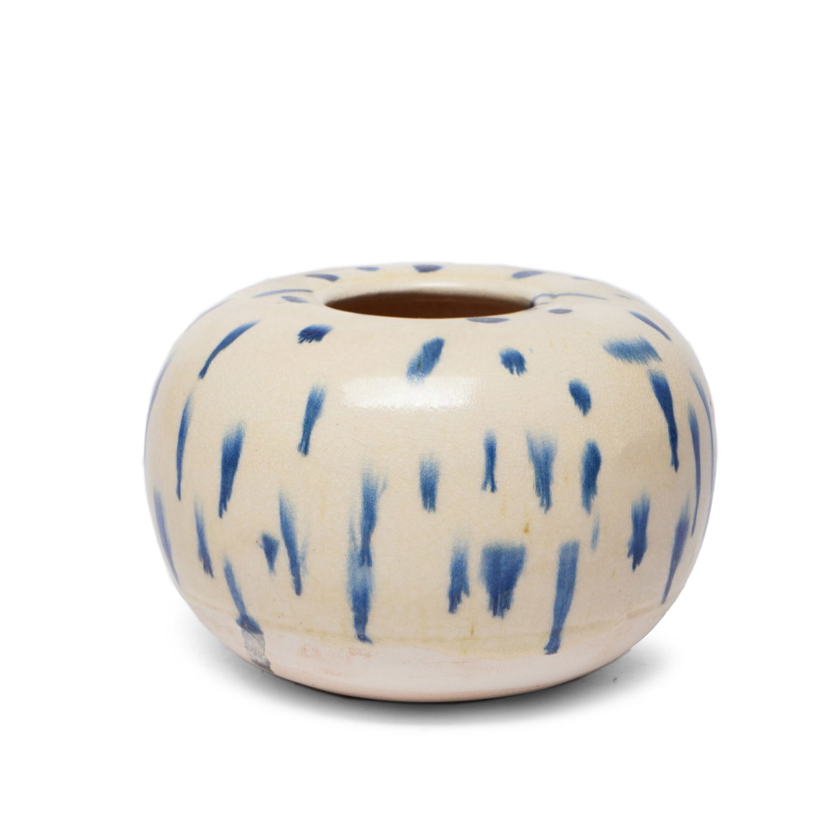 Tang Dynasty White Glazed Water Pot with Blue Splashes: H:7cmW:9cm This vessel is a white glazed water pot with blue splashes from the Gongxian kiln of the Tang Dynasty. It has a plump, rounded form with a small mouth and swollen belly. The body is