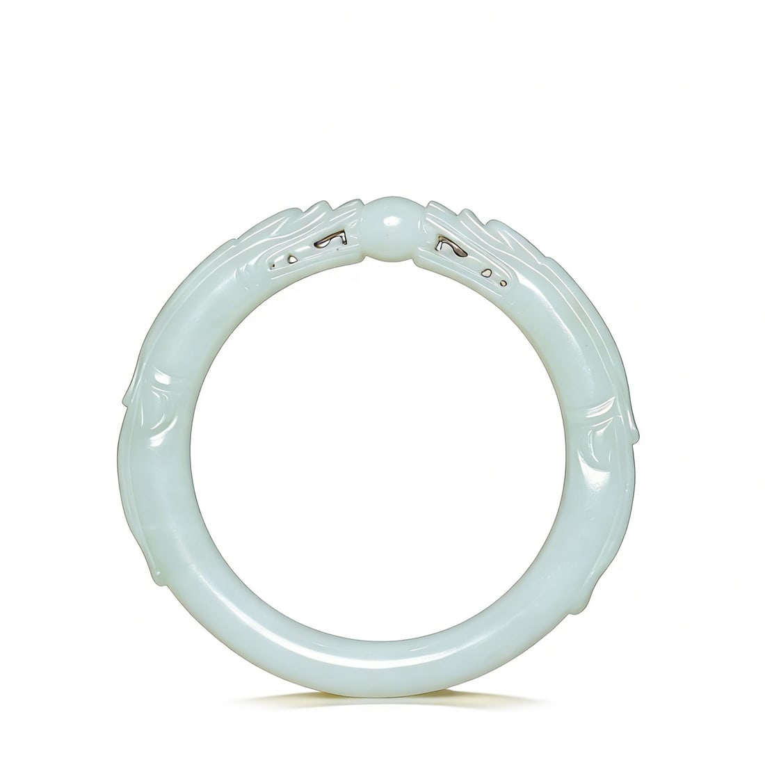 Qing Dynasty Hetian White Jade Bracelet: D:8cm D:5.5cm This is a Qing Dynasty Hetian white jade bracelet with two dragons playing with a pearl motif, a fine jade ornament. Carved from Hetian white jade with warm, luminous texture; the body i