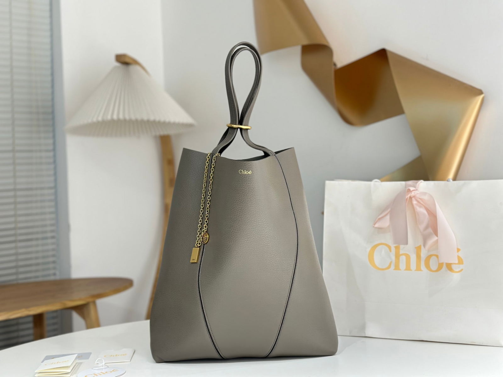 Chloe Spin Bag: Now I understand why so many celebrities love the Chloe Spin Bag. Its exquisite texture, lustrous finish, and feather light weight, combined with its cleverly designed embellishments, make it easy to