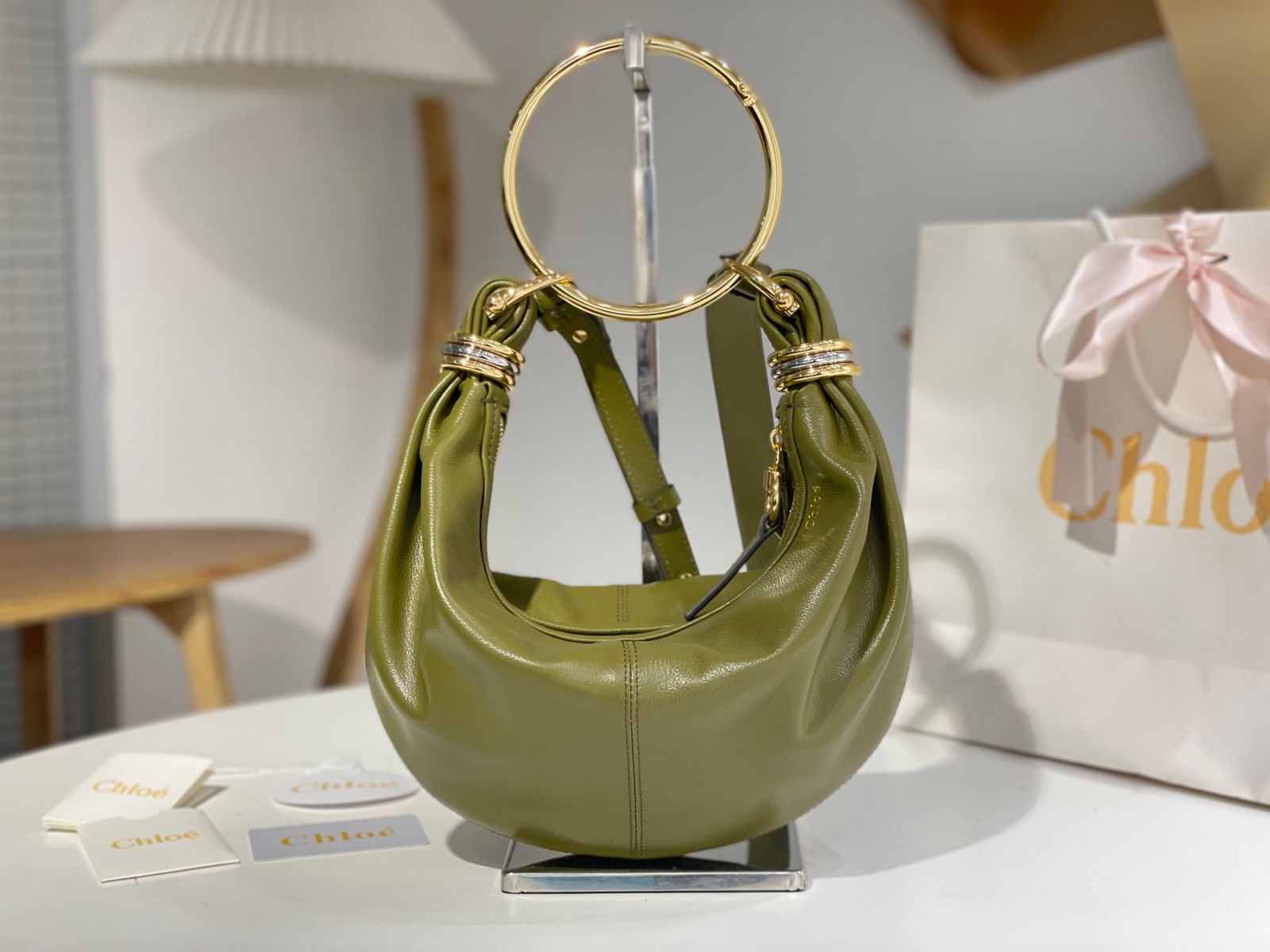 Chloe Bracelet Bracelet Bag: The Chloe Bracelet bag in green is a fall favorite among many Chloe celebrities. Continuing its classic style, it can be worn crossbody or carried by hand, exuding femininity when carried by hand and
