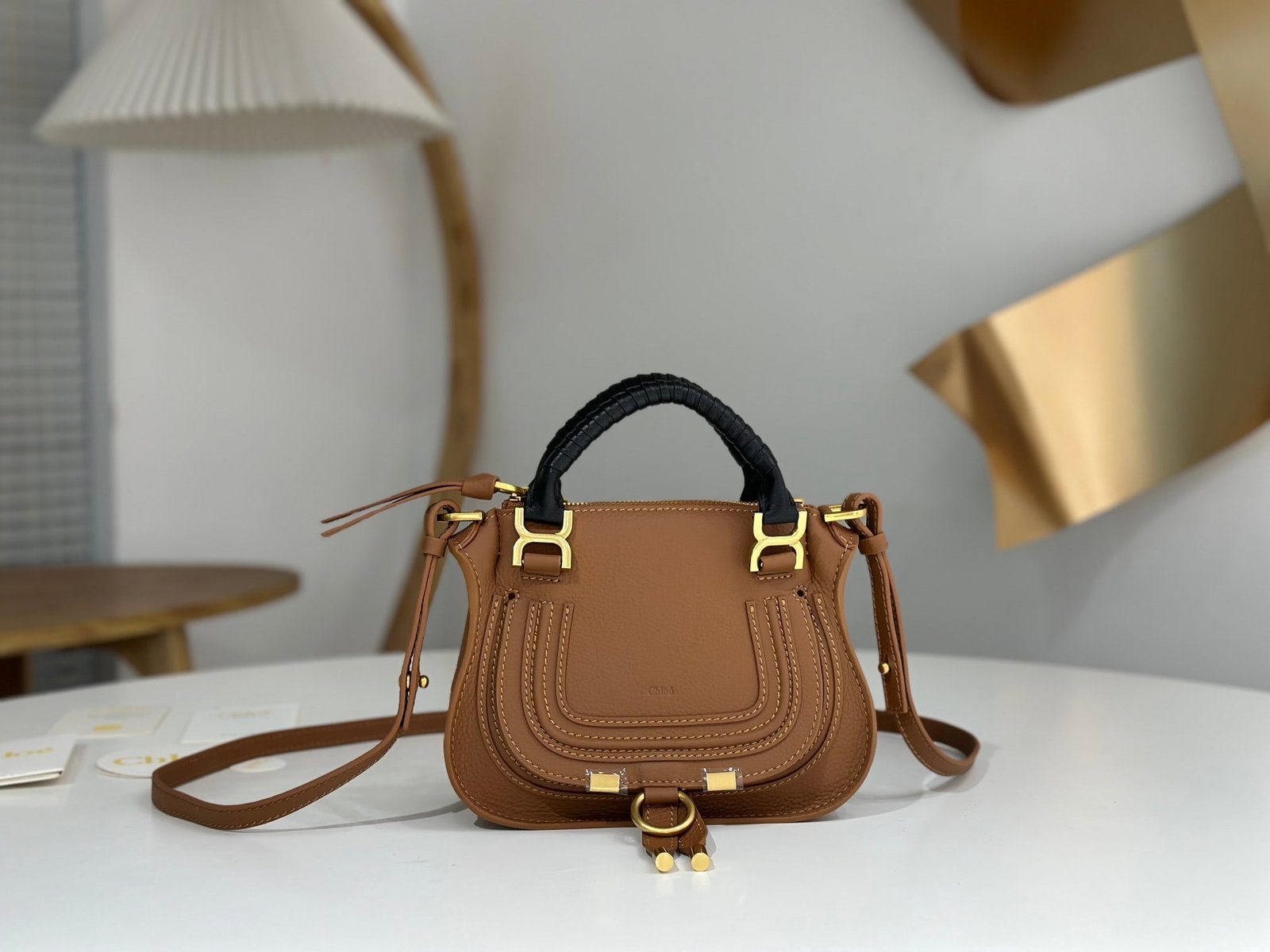 chloe marcie: The Chloe Marcie bag retains its vintage, distressed hardware, and features imported lambskin on the wrist and a suede lining. This is a best selling Chloe style that consistently resonates with custo
