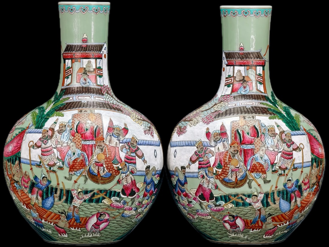 A pair of Qing Dynasty celadon famille rose vases with a gilt-painted panoramic scene of "Flooding: pair of Qing Dynasty celadon-glazed famille rose vases with a gilt-painted panoramic scene of "The Flood of Jinshan Temple." The vases are exquisitely crafted, with a rich and stable celadon glaze as